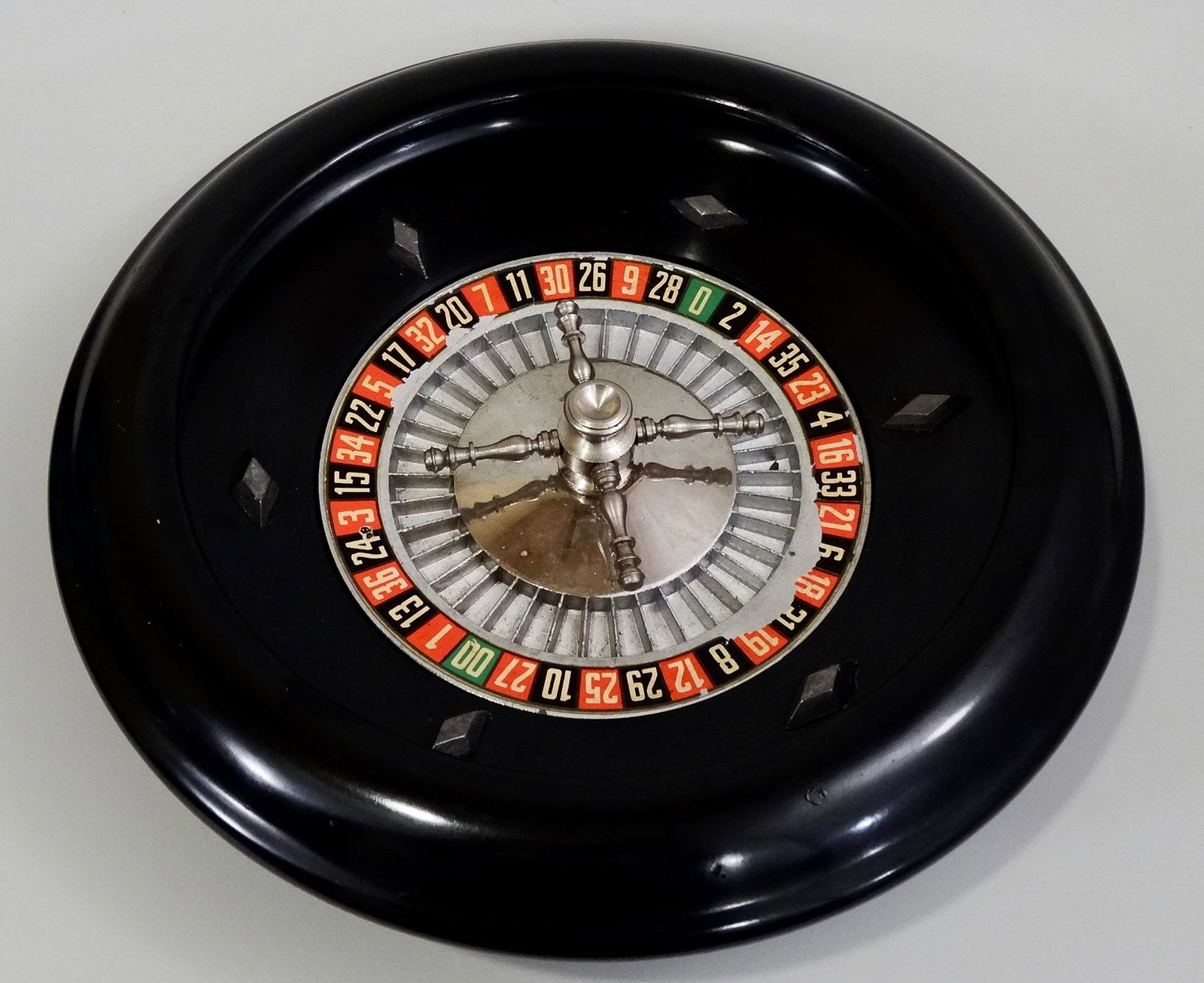 Vintage Bakelite Roulette Heavy Alloy Wheel: Vintage Bakelite Roulette Heavy Alloy Wheel 11 3/4 inches in diameter.