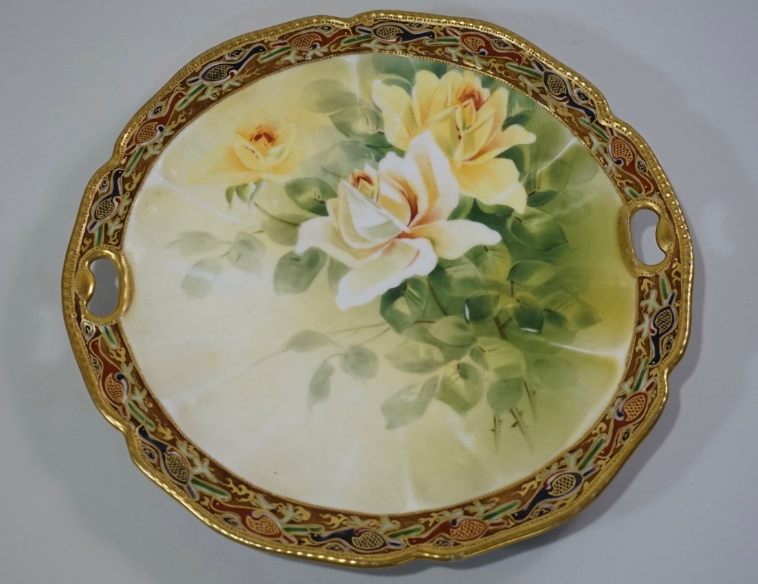 Nippon Porcelain Hand Painted Platter: Nippon Porcelain Hand Painted Platter Approximately 10 inches in diameter.