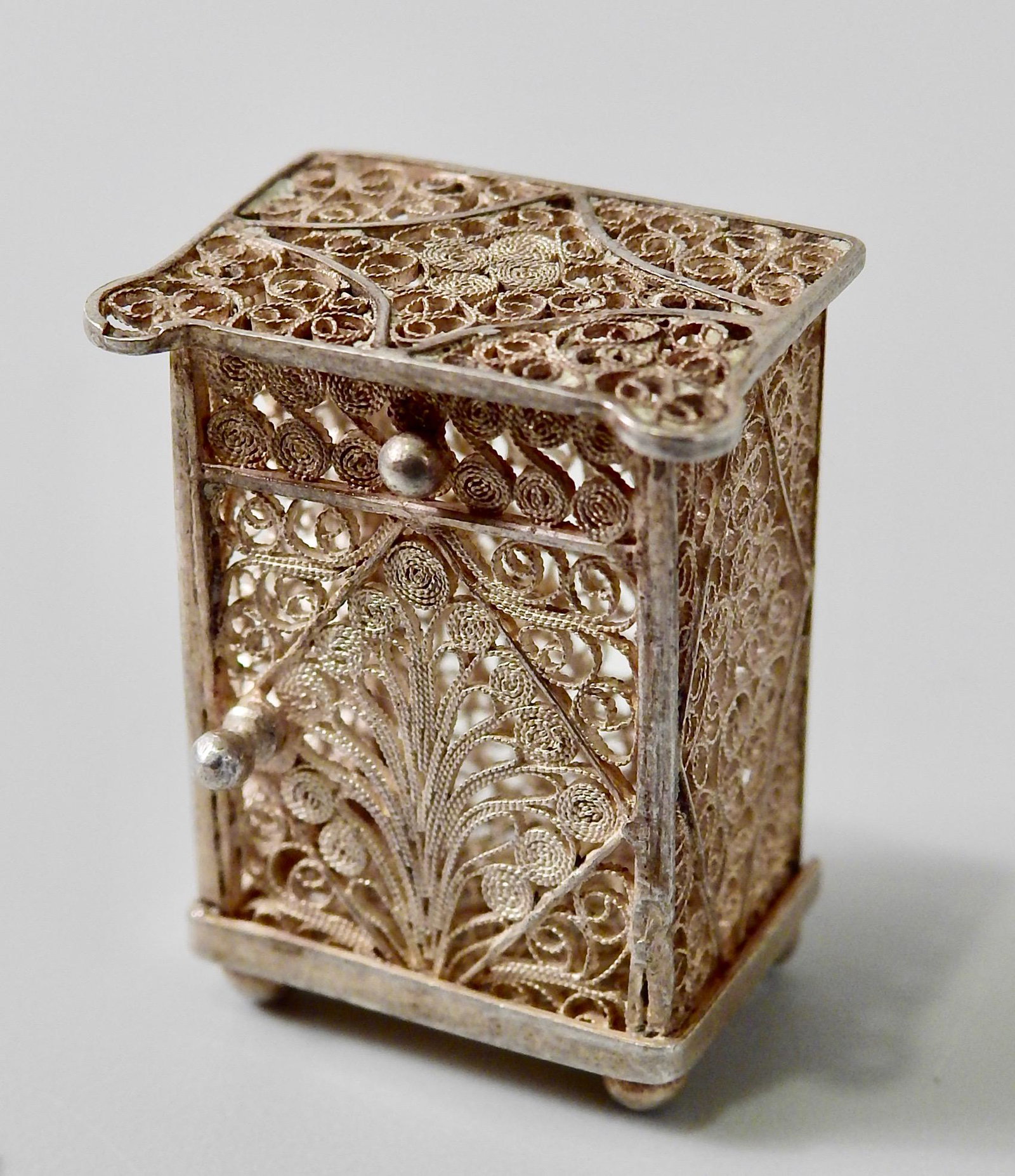 Miniature Silver Filigree Chest Charm Pendant: Miniature Silver Filigree Chest Charm Pendant Approximately 1 3/16 x 5/8 x 15/16 inches.