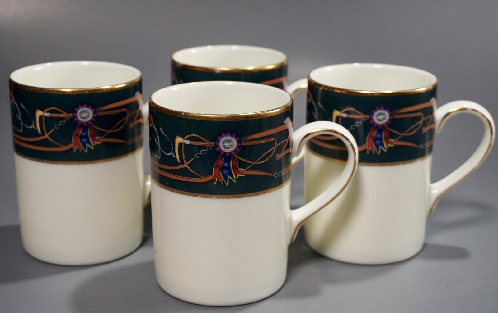 Equus Fine China by Franciscan Equestrian Mugs Designed: Equus Fine China by Franciscan Equestrian Mugs Designed by Jane St Gaston Lot of 4 Approximately 4 1/8 inches tall.