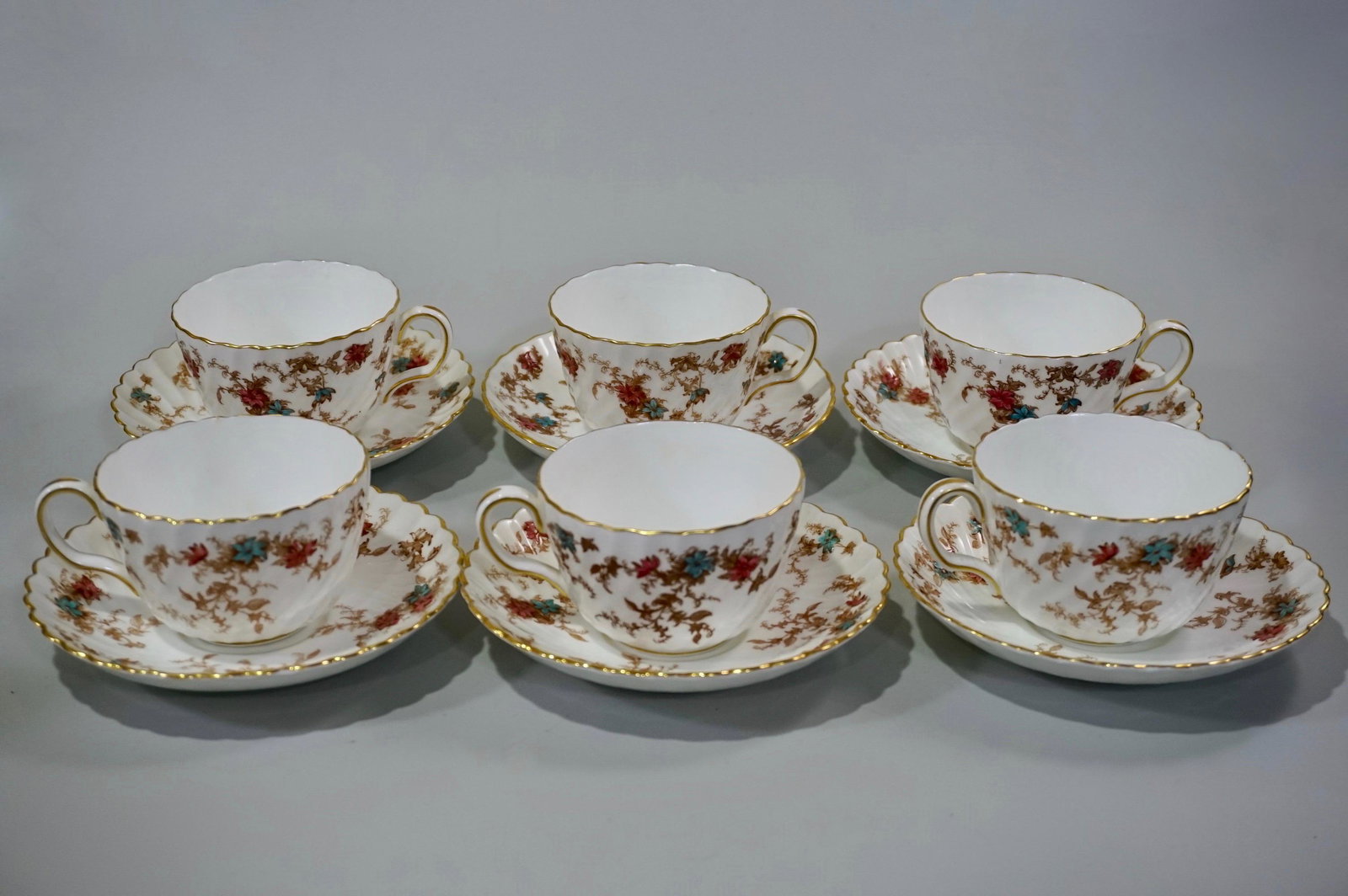 Ancestral Minton Bone China Tea Cup Saucer Lot of 6: Ancestral Minton Bone China Tea Cup Saucer Lot of 6 Sets Cups are approximately 4 1/4 x 3 1/2 x 2 1/4 inches; saucers are 5 5/8 inches in diameter.