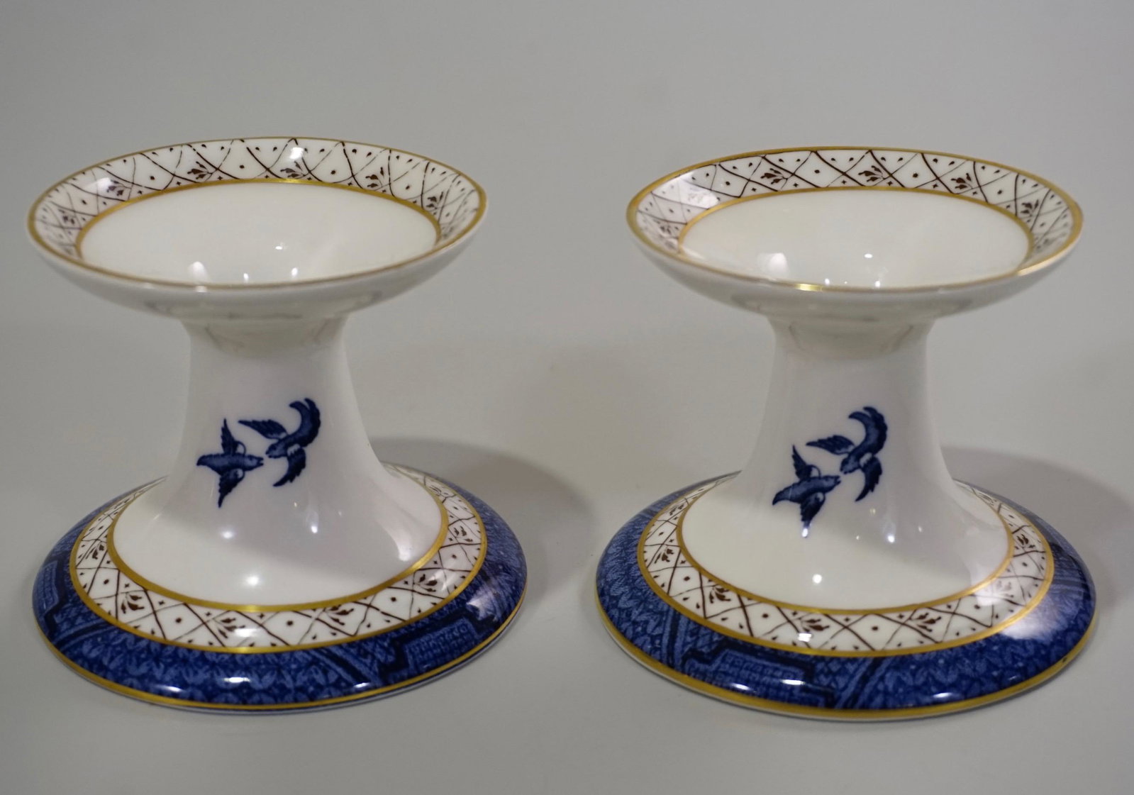 Royal Doulton Porcelain Candle Holder Pair Booths Real: Royal Doulton Porcelain Candle Holder Pair Booths Real Old Willow Approximately 3 1/16 x 3 5/8 inches in diameter.