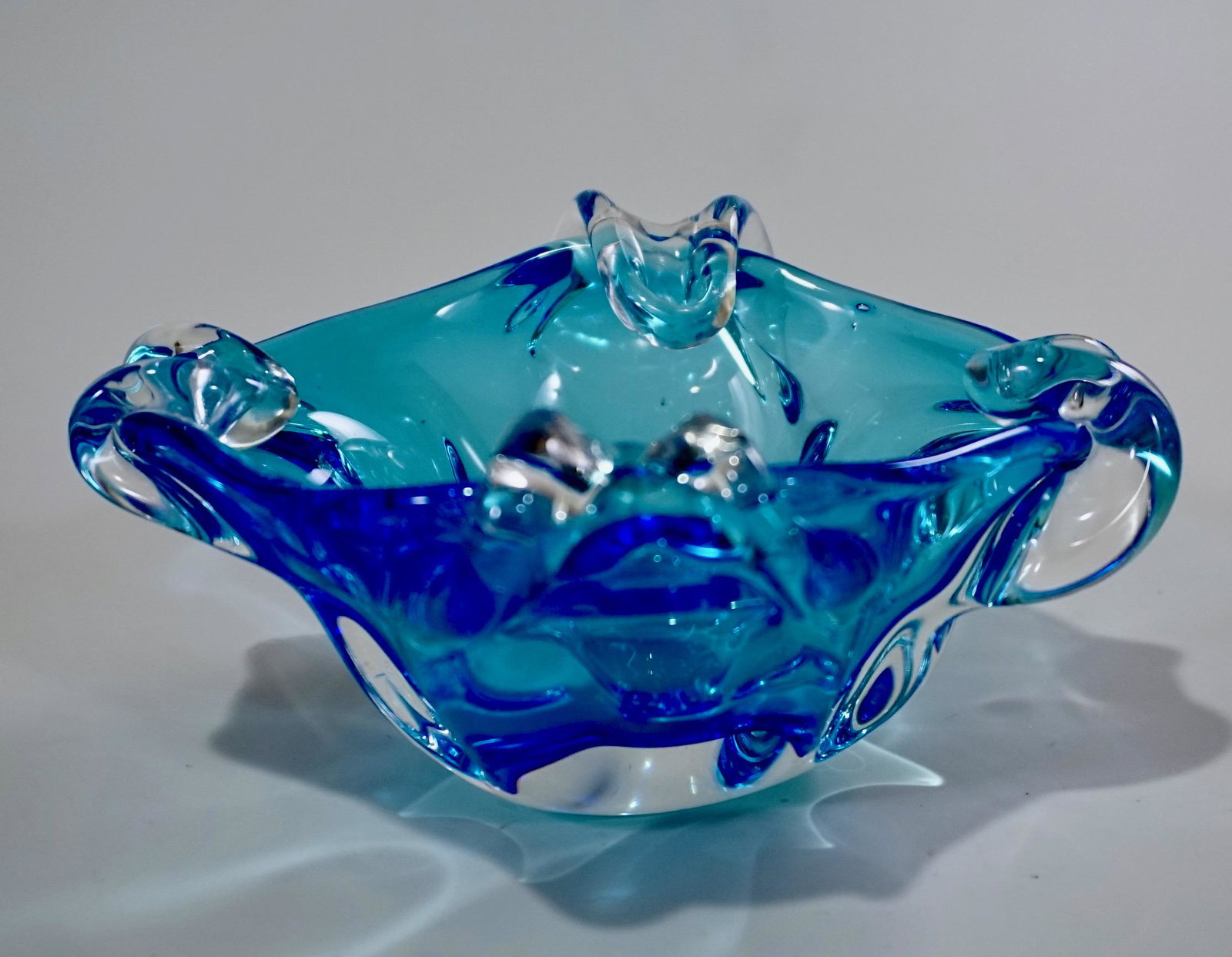 Vintage Blue Art Glass Ashtray Bowl Murano Italy: Vintage Blue Art Glass Ashtray Bowl Murano Italy Approximately 3 x 6 1/16 x 5 inches.
