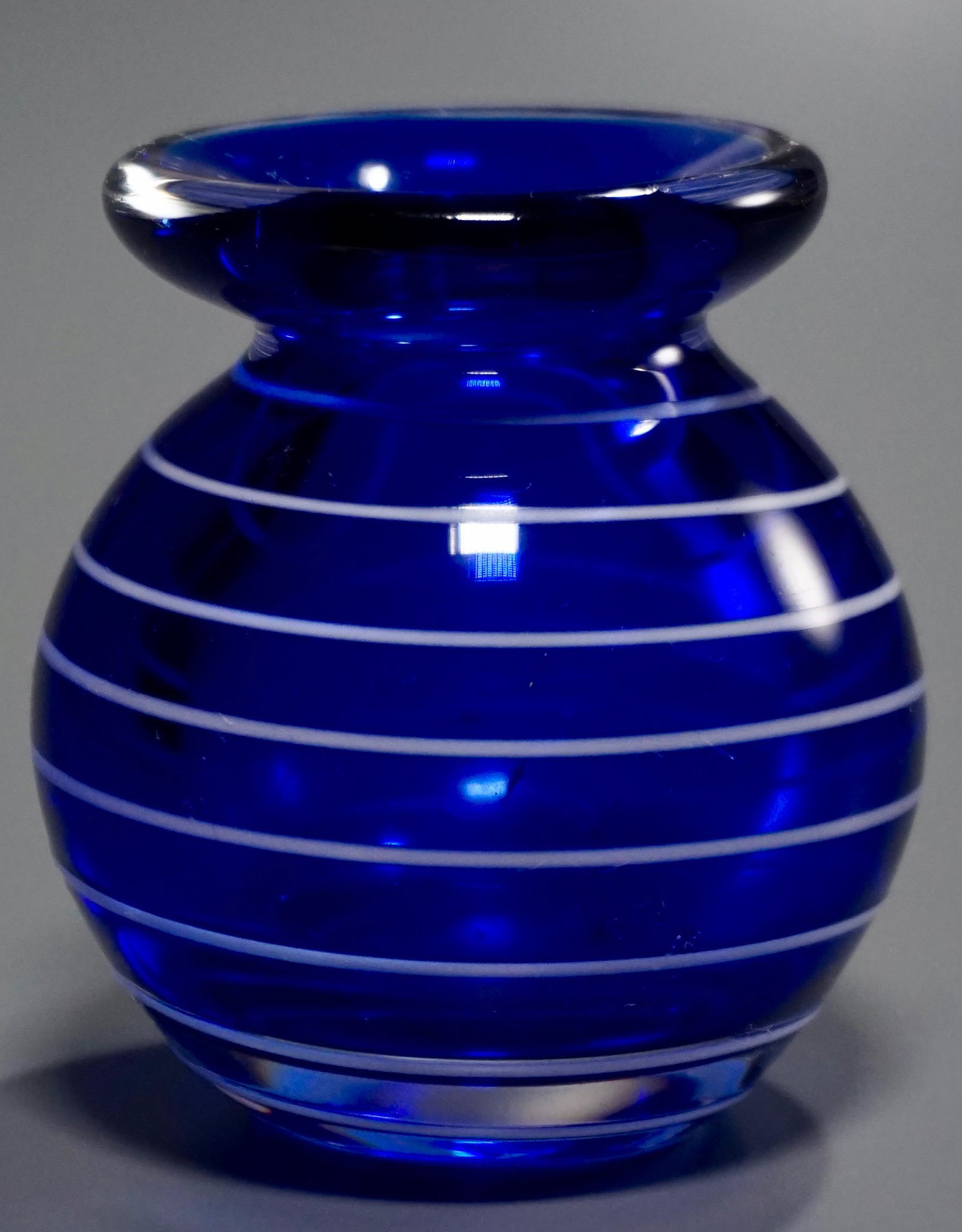 White Thread Blue Art Glass Vase Paperweight: White Thread Blue Art Glass Vase Paperweight Approximately 3 5/8 inches tall.