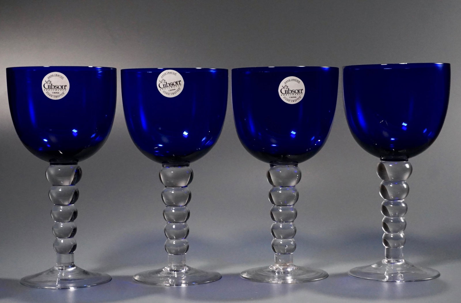 Cobalt Blue Gibson Goblets Ball Stem Lot of 4: Cobalt Blue Gibson Goblets Ball Stem Lot of 4 Approximately 7 1/2 inches tall. ATTENTION! All UNSOLD items from November 24th auction will be re-offered on our clearance event with only $5 starting bi