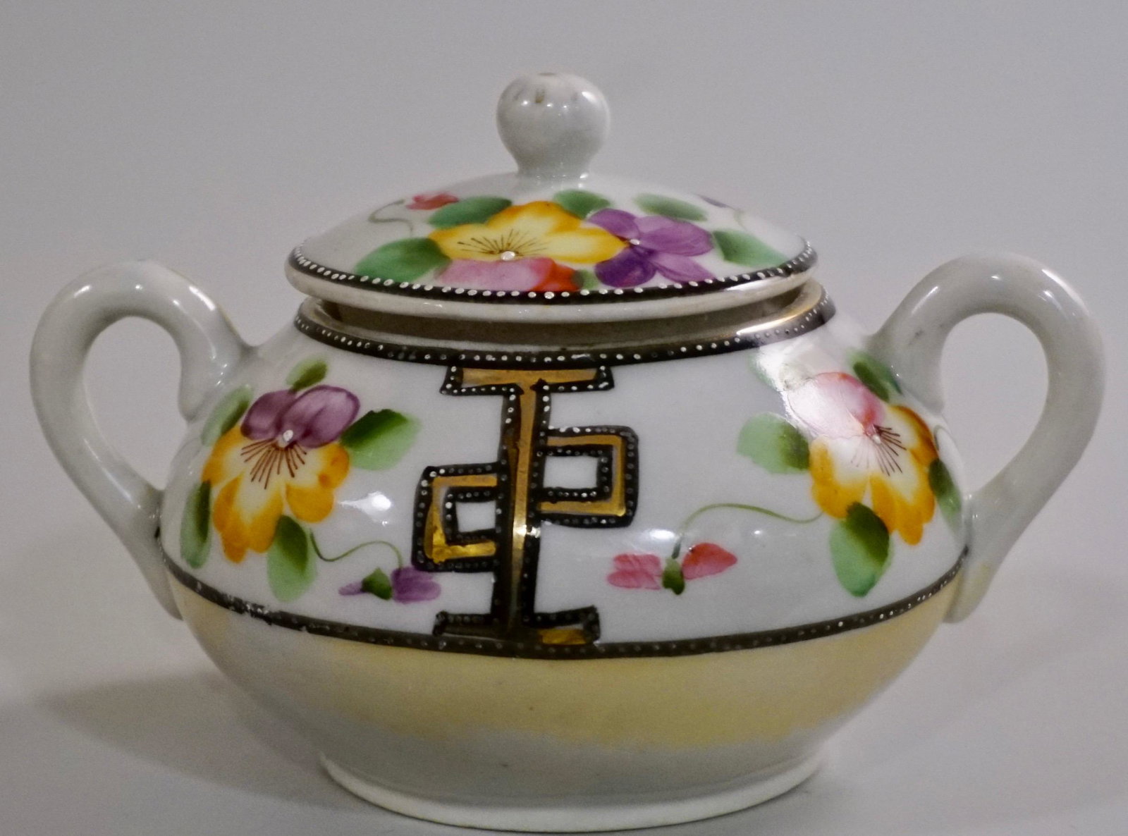 Vintage Nippon Porcelain Sugar Bowl with Cover: Vintage Nippon Porcelain Sugar Bowl with Cover Approximately 6 x 4 3/4 x 4 1/16 inches tall overall.