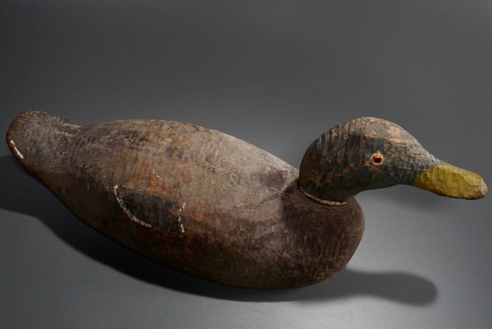 Antique Vintage Carved Wood Duck Decoy Glass Eyes: Antique Vintage Carved Wood Duck Decoy Glass Eyes Approximately 16 1/4 x 5 1/2 x 6 5/16 inches.