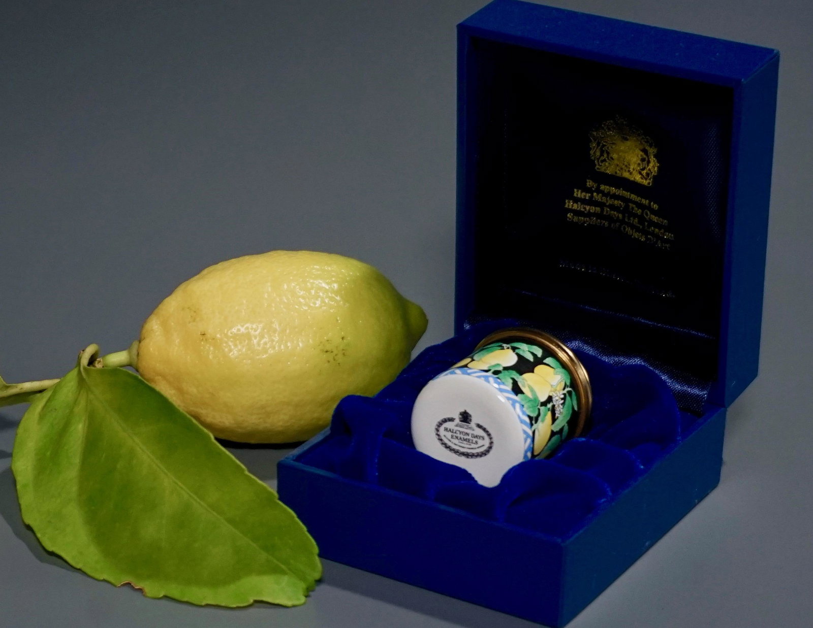Halcyon Days Enamels Cylinder Lemons Pill Box Screw Lid: Halcyon Days Enamels Cylinder Lemons Pill Box Screw Lid Approximately 1 3/8 inches tall x 1 1/8 inches in diameter.