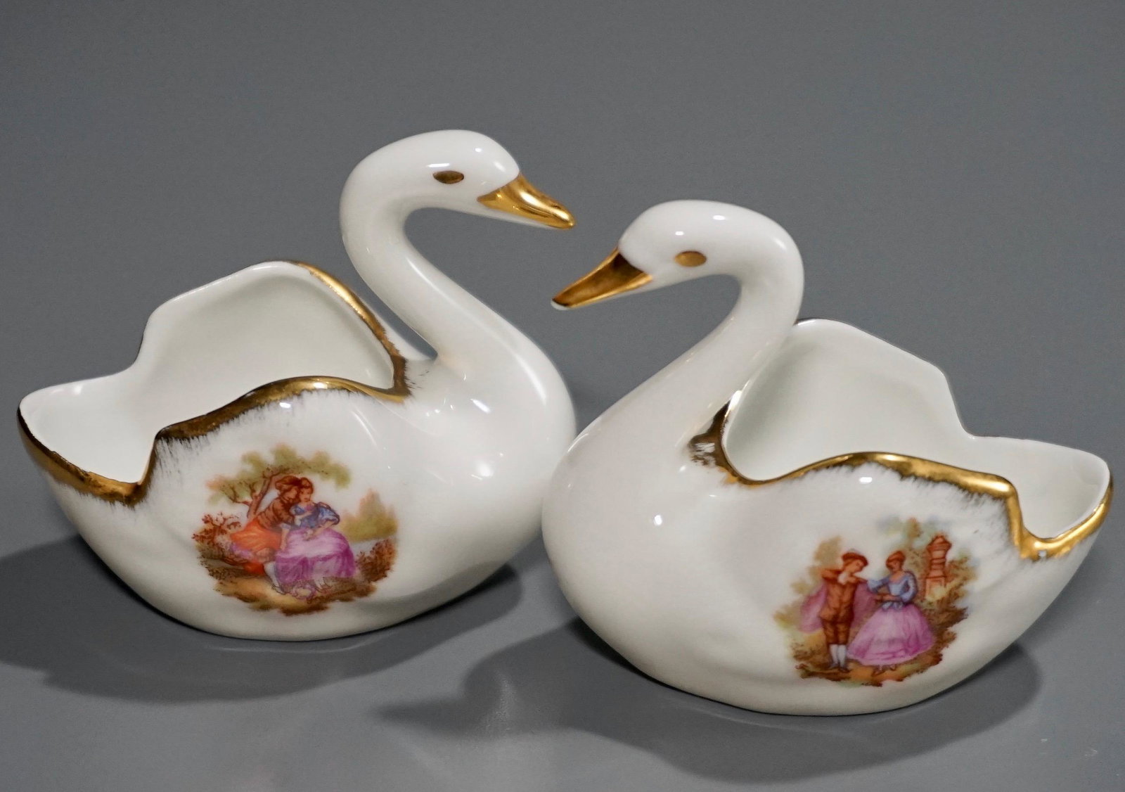 Vintage Limoges Porcelain Swan Open Salt Cellar Lot of: Vintage Limoges Porcelain Swan Open Salt Cellar Lot of 2 Approximately 2 5/8 x 1 3/4 x 2 5/16 inches tall.