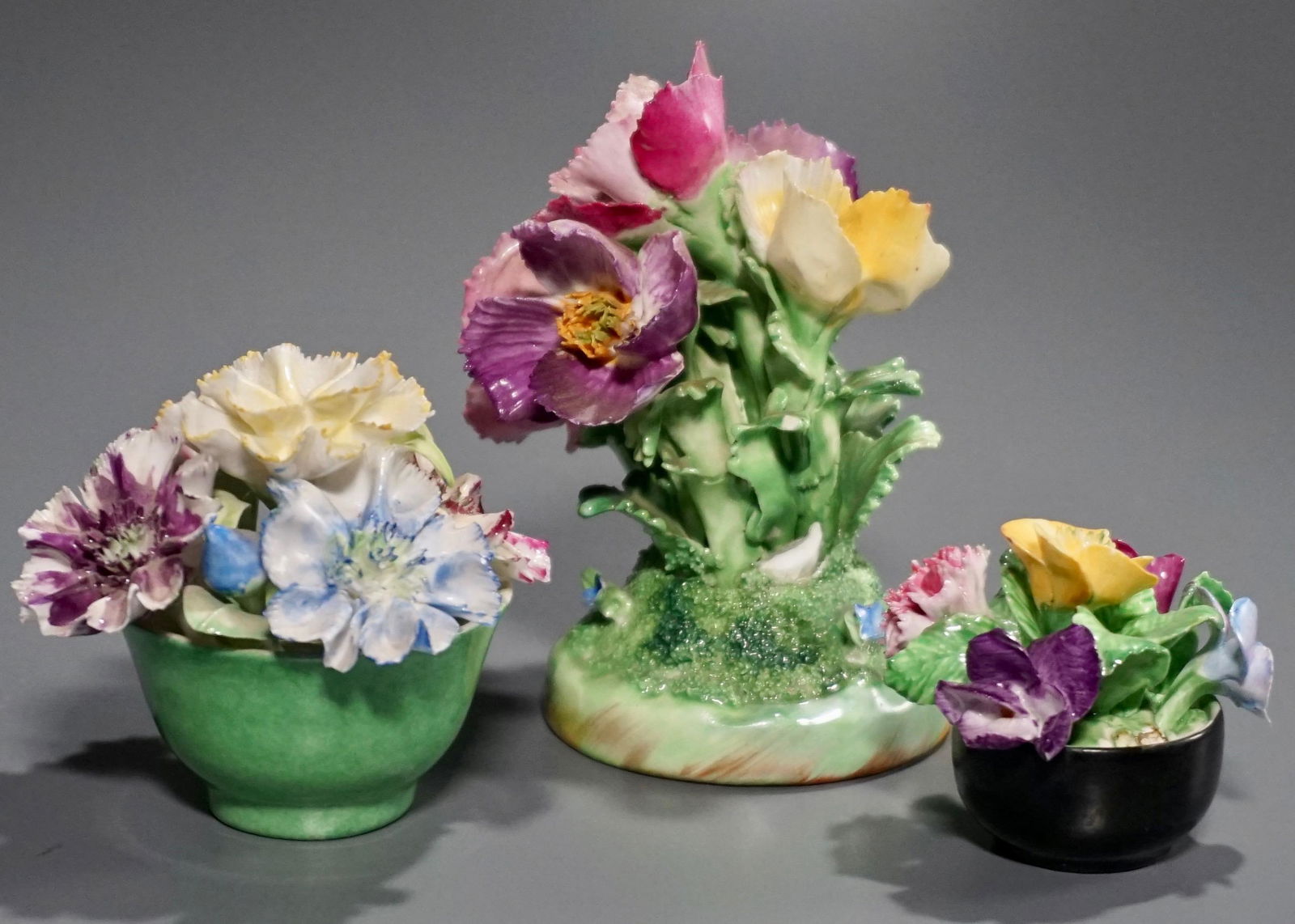 Crown Staffordshire Coalport Bone China Porcelain: Crown Staffordshire Coalport Bone China Porcelain Flowers Decorations Lot of 3 Approximately 3 11/16; 2 1/2 and 1 9/16 inches tall.