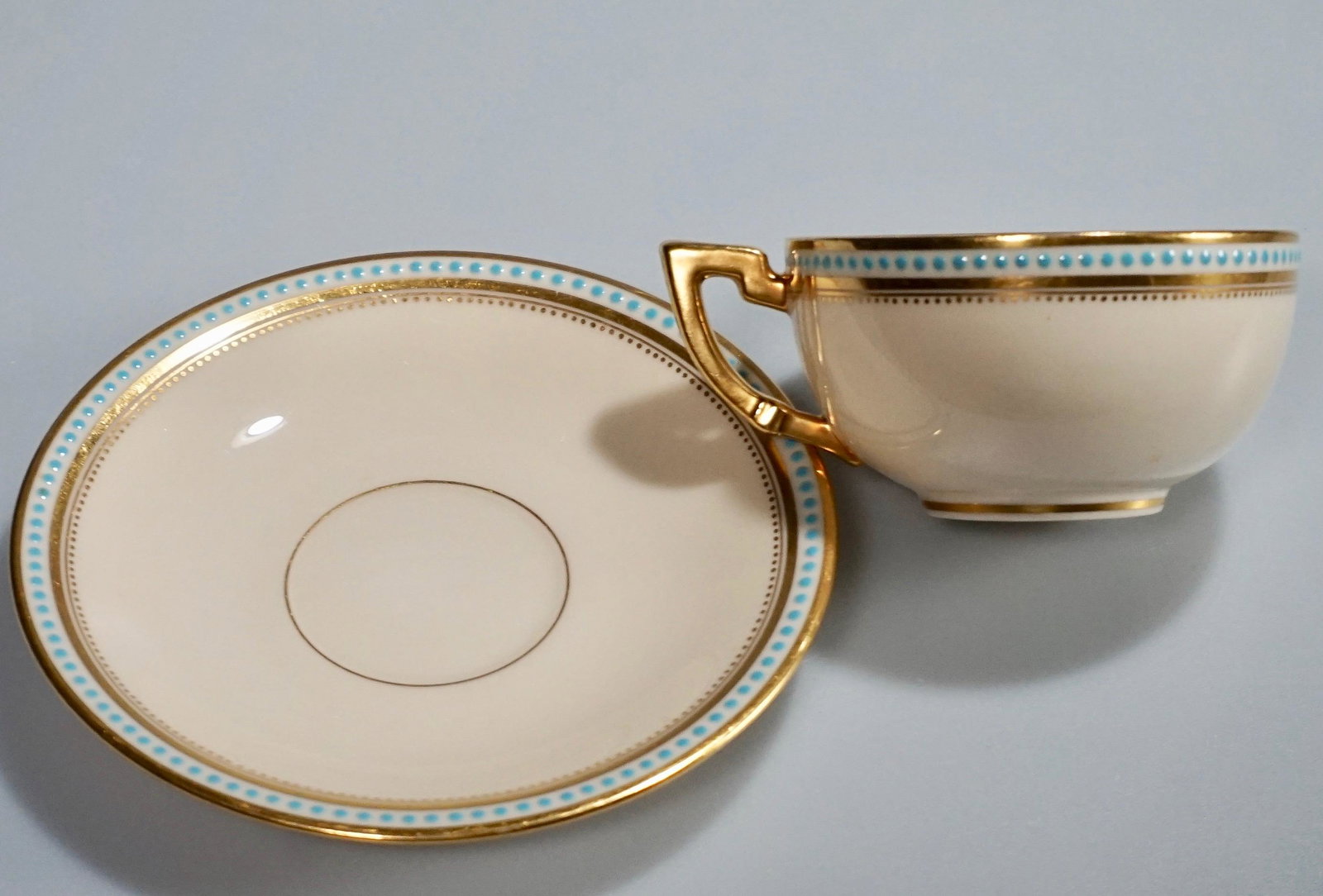 Lenox Turquoise Enamel Jeweled Cabinet Cup Saucer Set: Lenox Turquoise Enamel Jeweled Cabinet Cup Saucer Set Cup is approximately 4 1/8 x 3 1/4 x 1 3/4 inches tall; the saucer is about 5 1/4 inches in diameter.