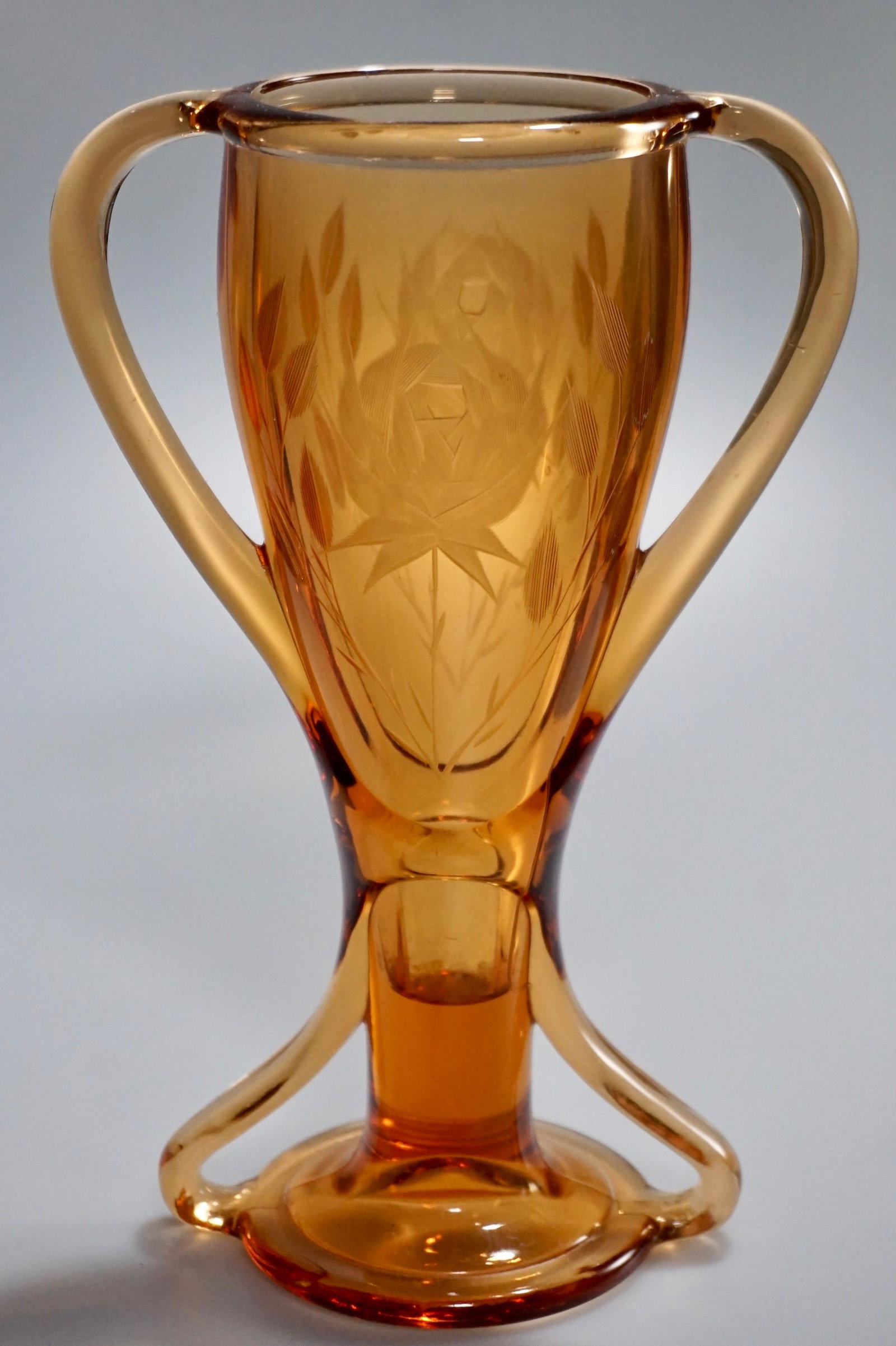 Art Deco Period Amber Fostoria Glass Vase Cut Flower: Art Deco Period Amber Fostoria Glass Vase Cut Flower Design Approximately 8 3/16 inches tall.