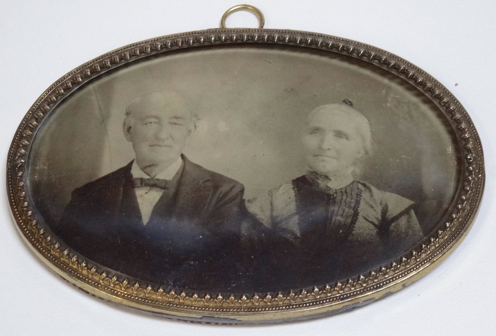 Antique Late 19th Century Older Couple Photo Oval Frame: Antique Late 19th Century Older Couple Photo Oval Frame Beveled Glass Approximately 6 1/18 x 4 1/4 inches.