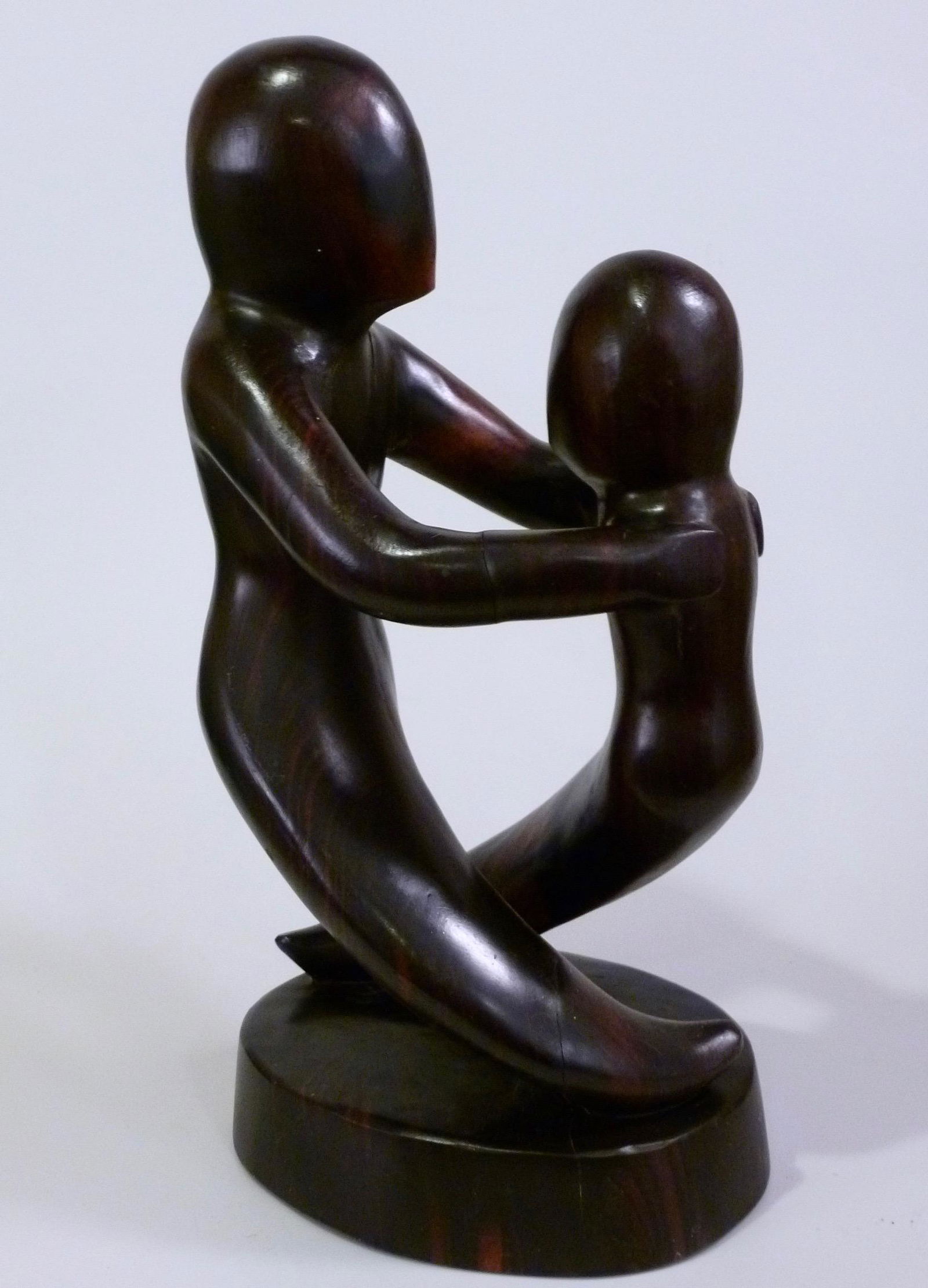 Mid Century Abstract Ebony Wood Carving Sculpture: Mid Century Abstract Ebony Wood Carving Sculpture Approximately 14 inches tall.