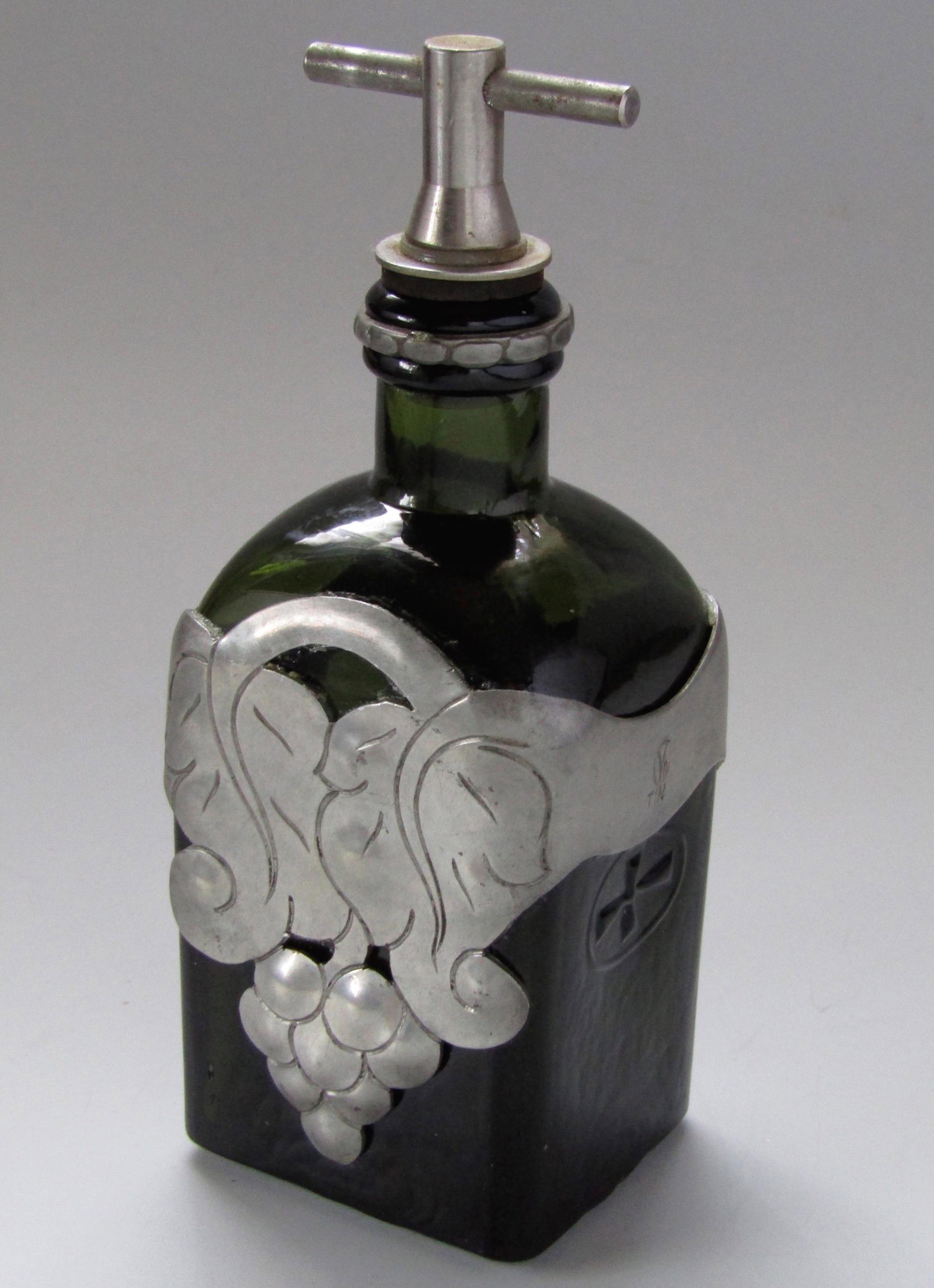 Green Glass Bottle Unique Pewter Overlay Decanter: Green Glass Bottle Unique Pewter Overlay Decanter Steampunk Barware Approximately 6 5/8 inches overall.