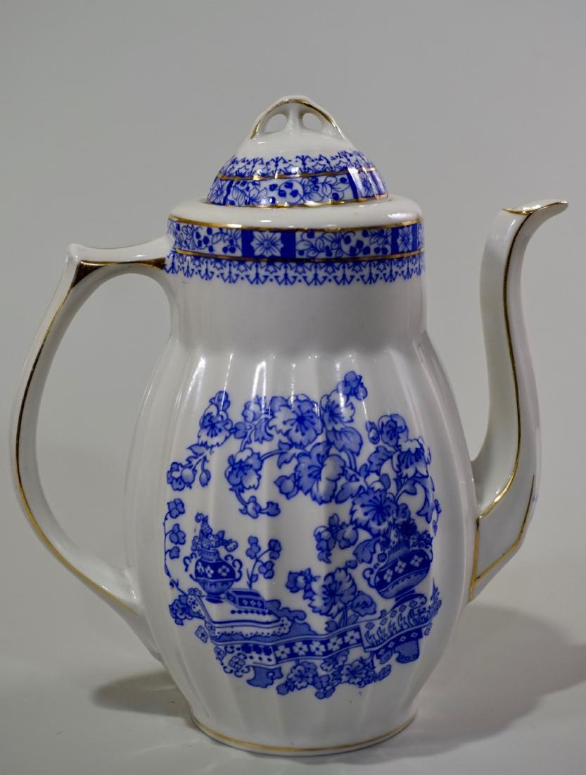 Vintage Blue Willow Porcelain Coffee Pot: Vintage Blue Willow Porcelain Coffee Pot Approximately 7 x 3 _ x 7 _ inches tall.