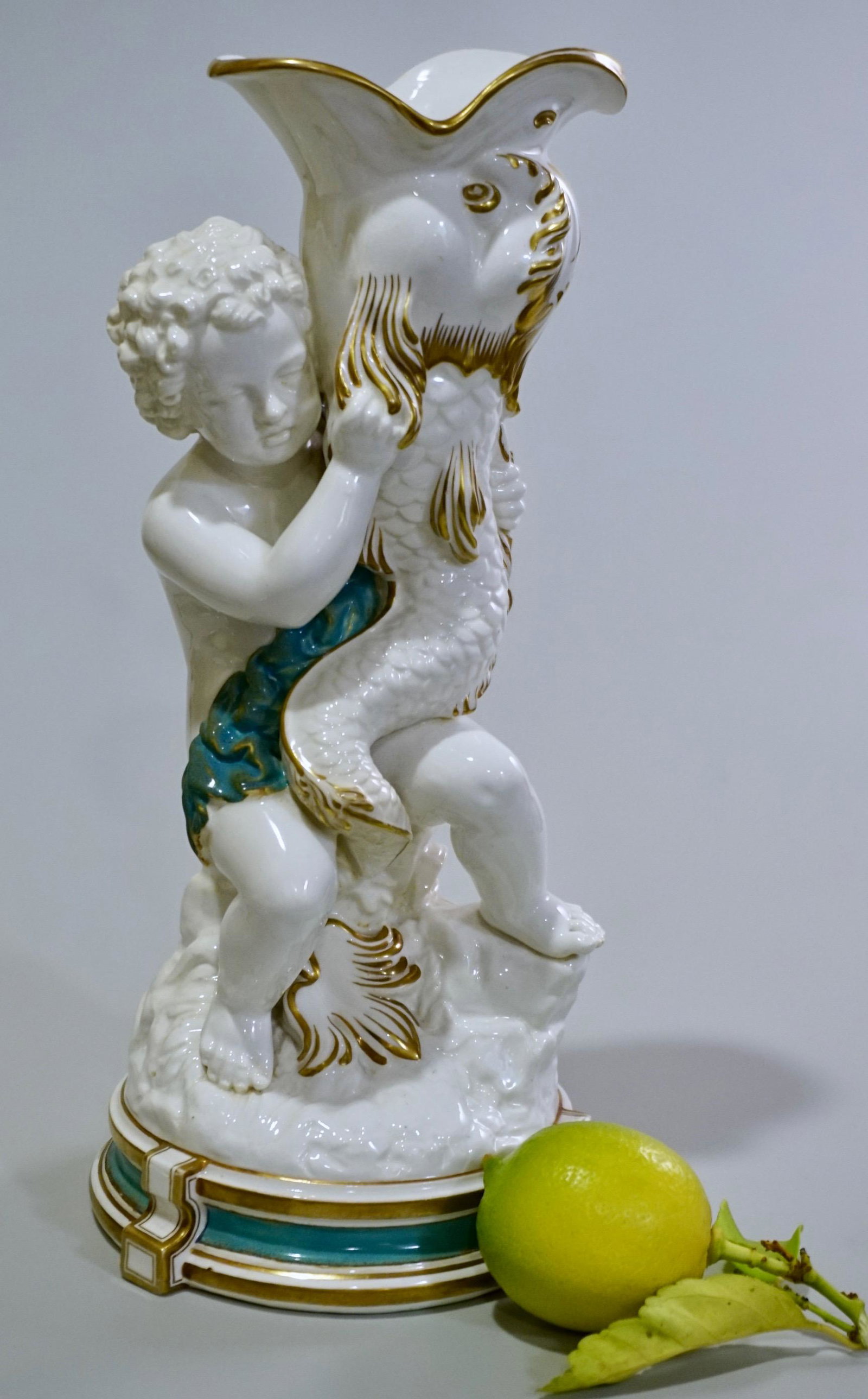 Minton Style Pottery Blue & White Cherub Dolphin: Minton Style Pottery Blue & White Cherub Dolphin Figural Vase Approximately 10 _ inches tall.