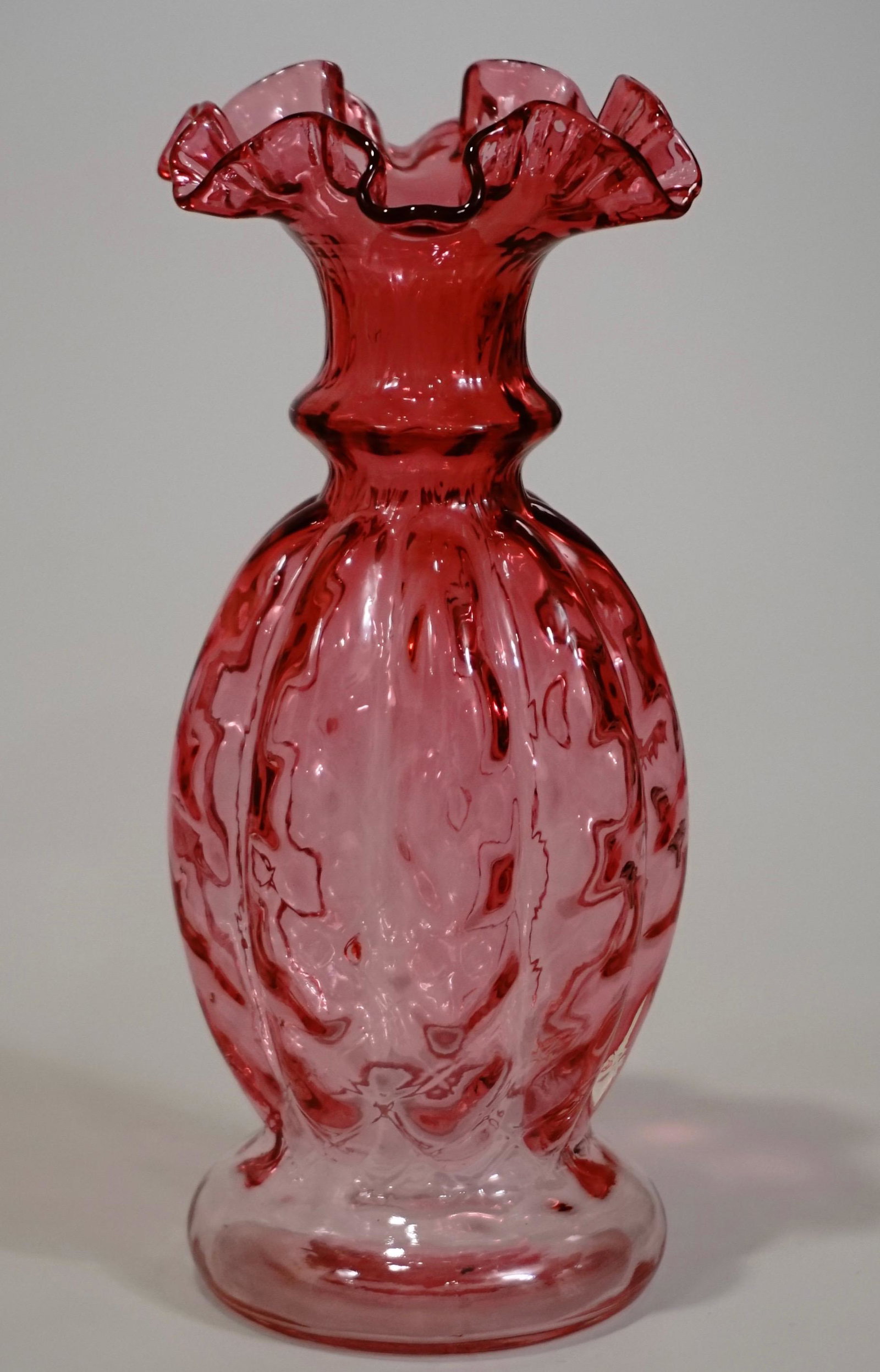Victorian Cranberry Glass Vase: Victorian Cranberry Glass Vase Approximately 8 1/4 inches tall and 3 3/8 inches in diameter.
