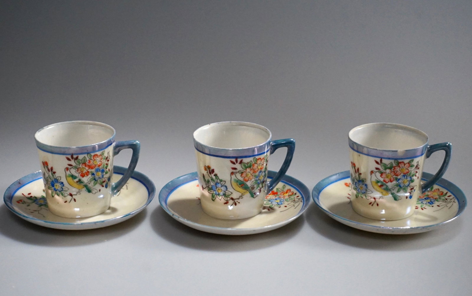 Nippon Hand Painted Pearl Luster Demitasse Cup and: Nippon Hand Painted Pearl Luster Demitasse Cup and Saucer Fine Porcelain Made in Japan Cups are approximately 2 1/2 x 1/7/8 x 1 15/16 inches tall; the saucers are about 3 3/4 inches in diameter.