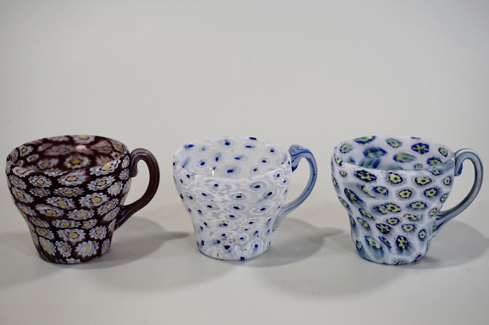 Italian Murano Glass Millefiori Cup Lot of 3: Italian Murano Glass Millefiori Cup Lot of 3 Approximately 3 3/8 x 2 7/8 x 2 1/2 inches tall.