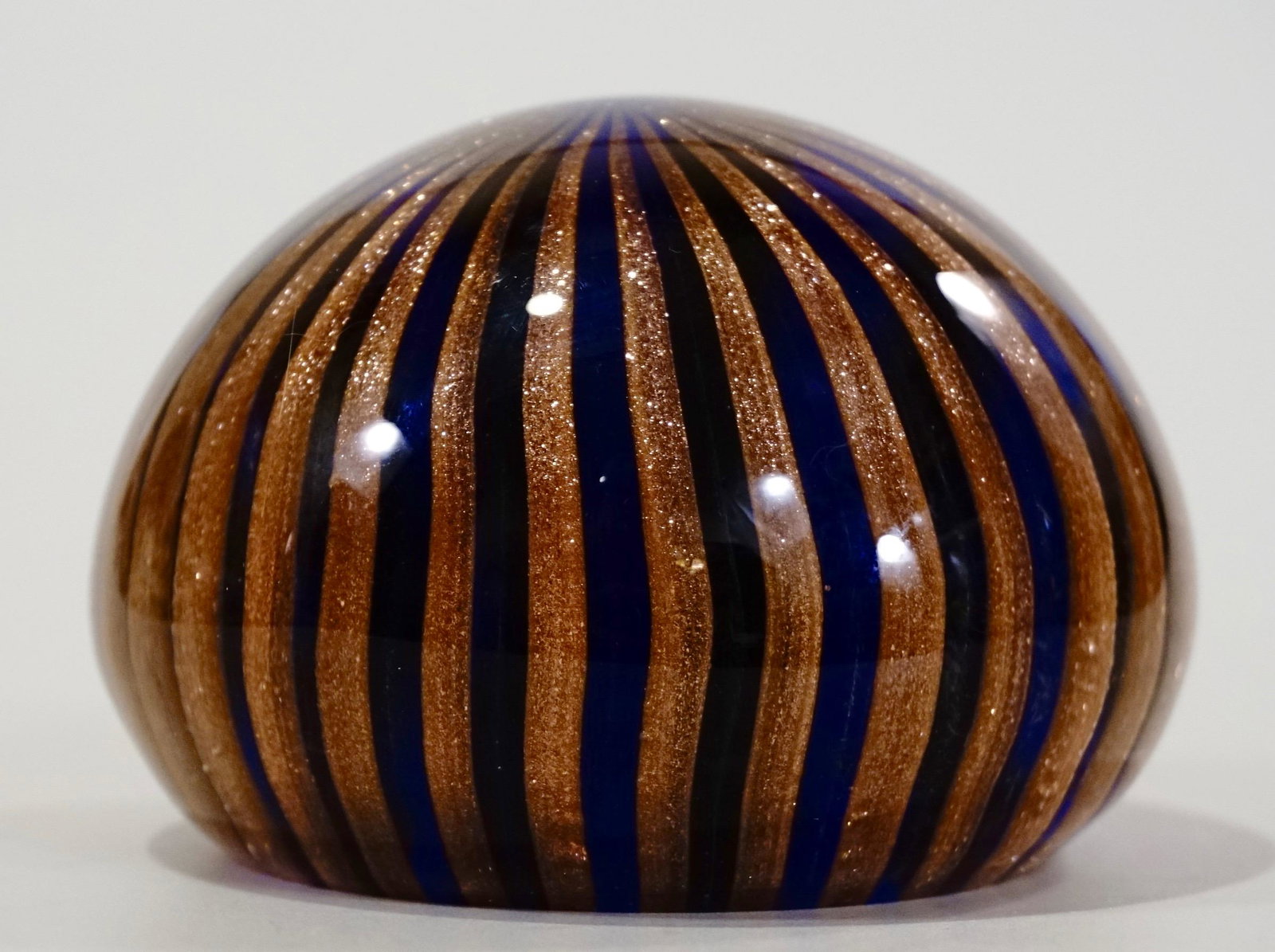 Art Glass Paper Weight Aventurine Cobalt: Art Glass Paper Weight Aventurine Cobalt Approximately 2 3/16 x 3 1/4 inches in diameter.
