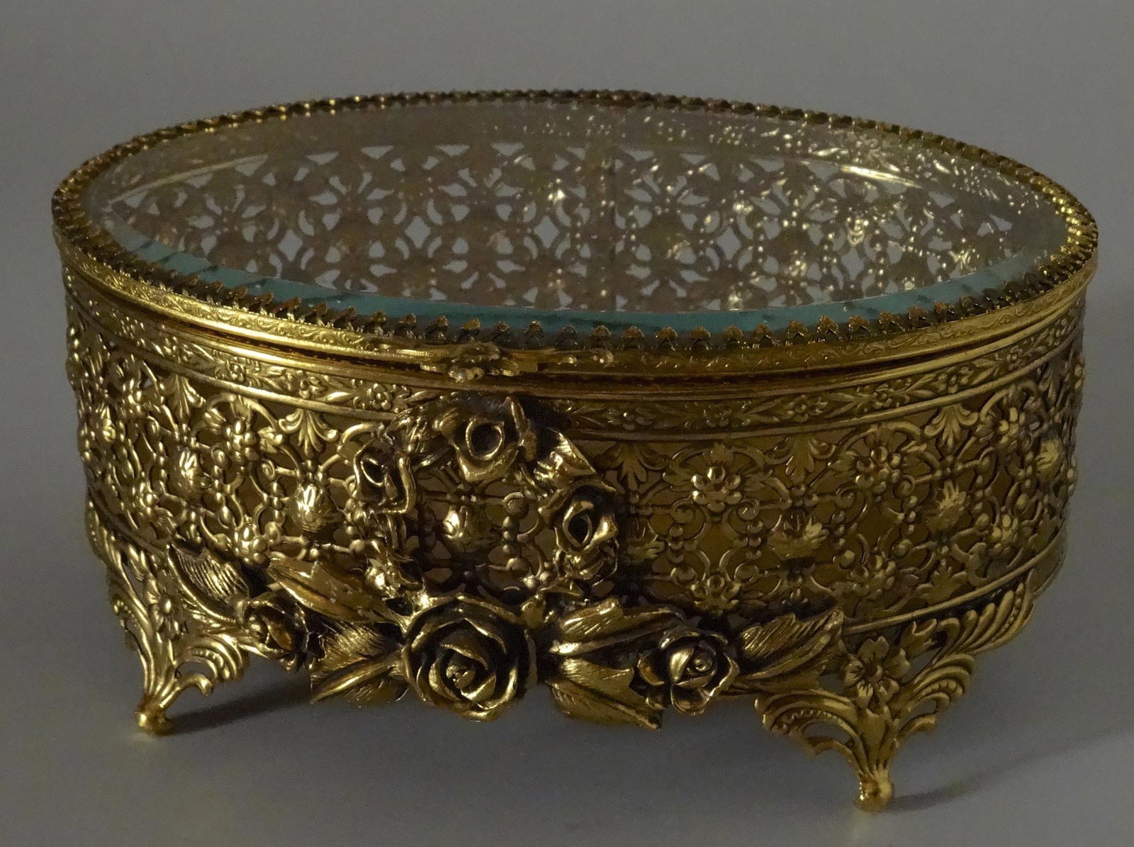 Vintage Ornate Brass and Beveled Glass Jewelry Casket: Vintage Ornate Brass and Beveled Glass Jewelry Casket Vanity Box Approximately 6 1/8 x 4 3 /16 x 3 inches tall.
