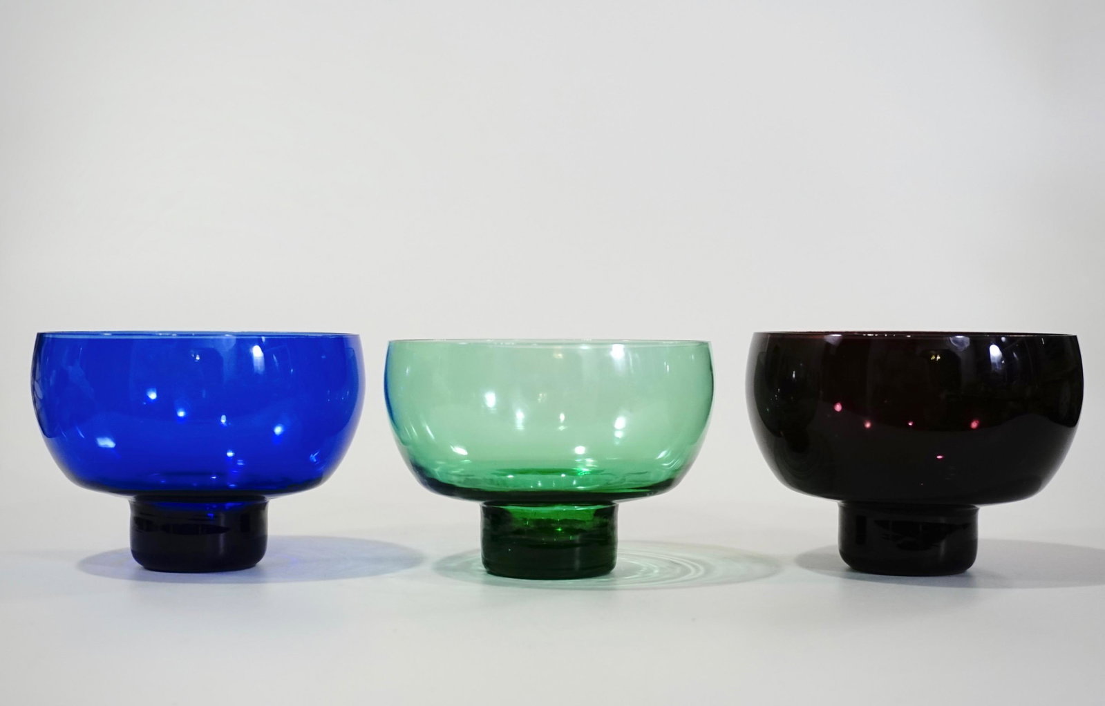 Mid Century Minimalist Glass Bowl Lot of 3 Amethyst: Mid Century Minimalist Glass Bowl Lot of 3 Amethyst Cobalt Green Approximately 2 3/4 x 4 1/16 inches in diameter.