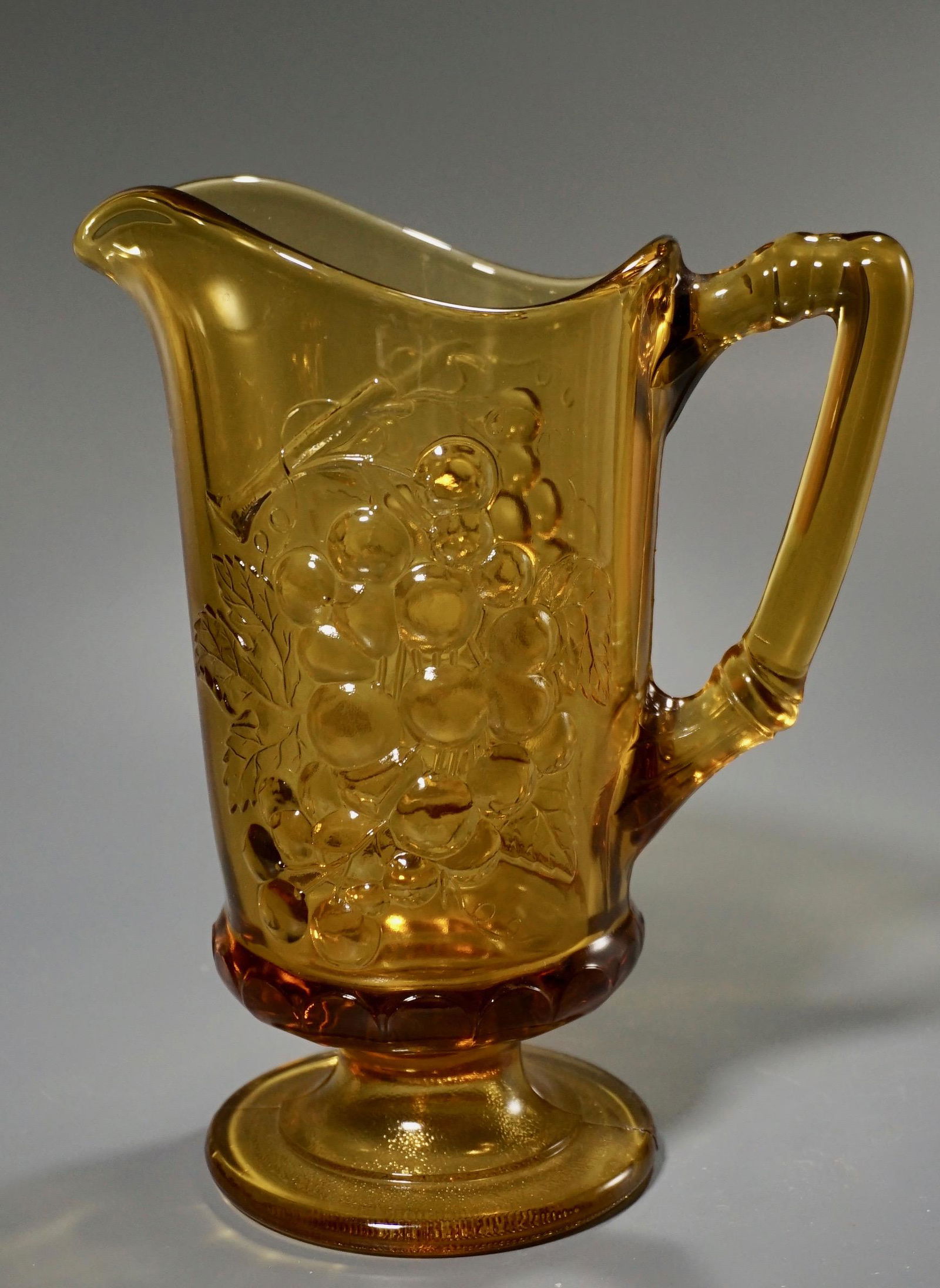 Vintage Amber Pressed Glass Grape Motif Pitcher (1 of 4)