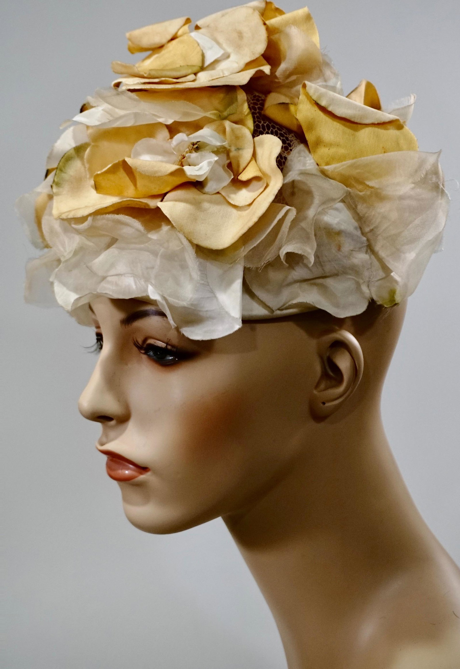 Joseph Magnin Betmar Flower Hat: Joseph Magnin Betmar Flower Hat Approximately 20 3/4 inches in circumference.