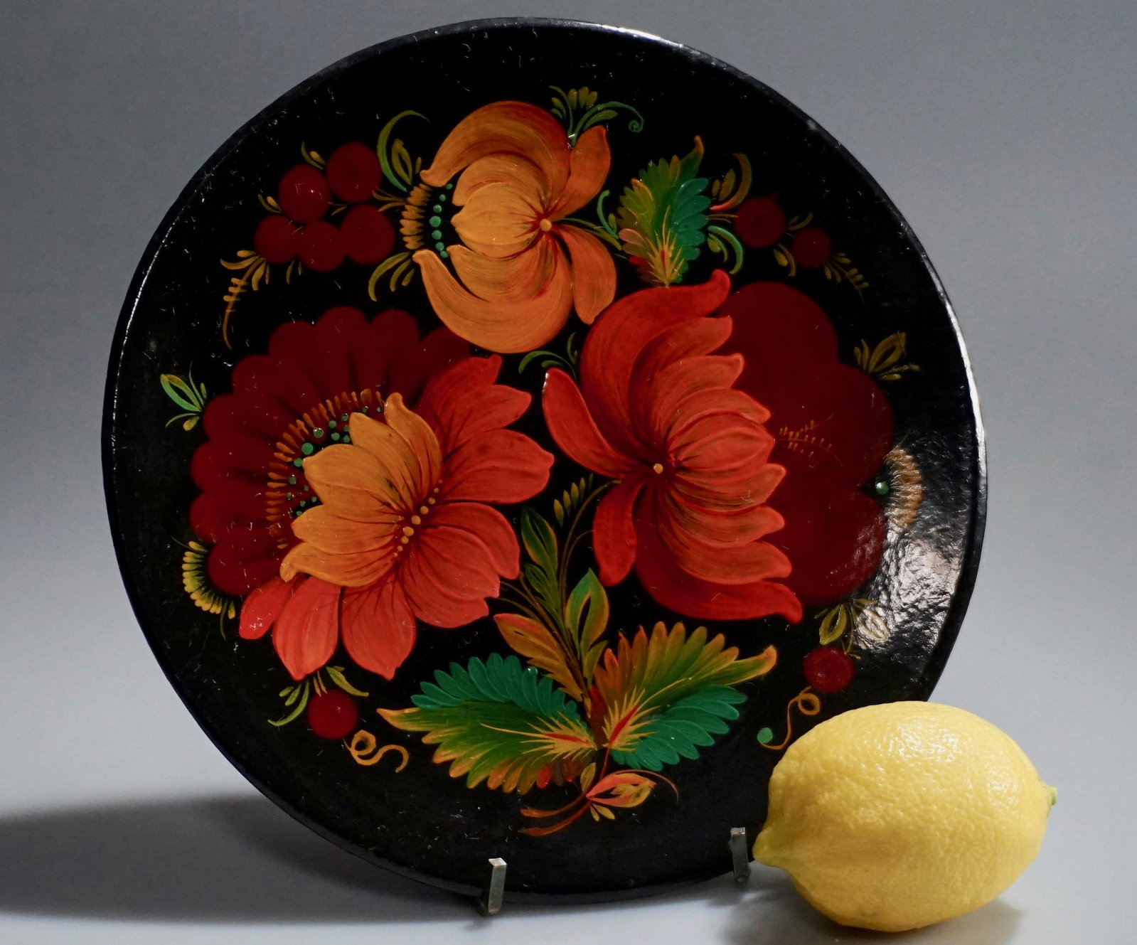 Folk Painted Ukrainian Wooden Plate Made in USSR: Folk Painted Ukrainian Wooden Plate Made in USSR Approximately 8 inches in diameter.