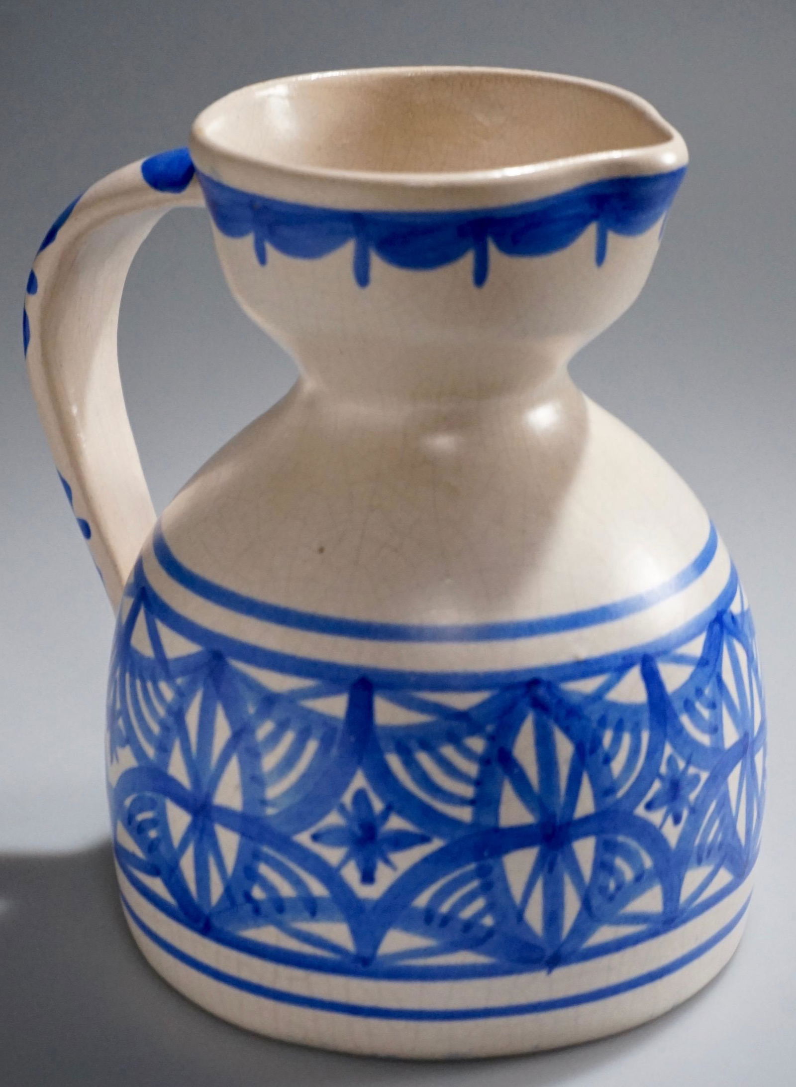 Vintage Mid Century Hand Painted Pottery Pitcher: Vintage Mid Century Hand Painted Pottery Pitcher Approximately 4 13/16 x 4 7/16 x 5 5/8 inches tall.