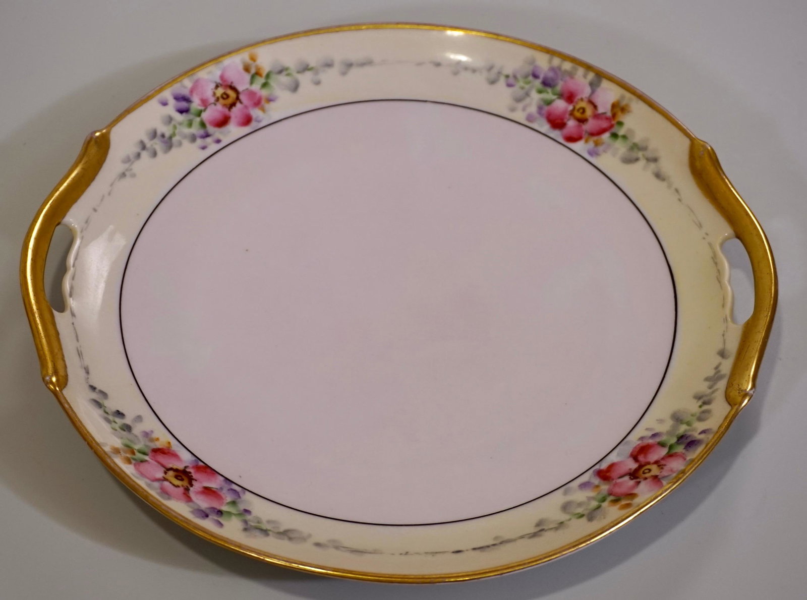 Vintage 1930's Art Deco Porcelain Cake Plate Hand: Vintage 1930's Art Deco Porcelain Cake Plate Hand Painted Oval Platter with Handles unmarked, attributed to Noritake Approximately 9 3/4 x 9 1/2 inches.