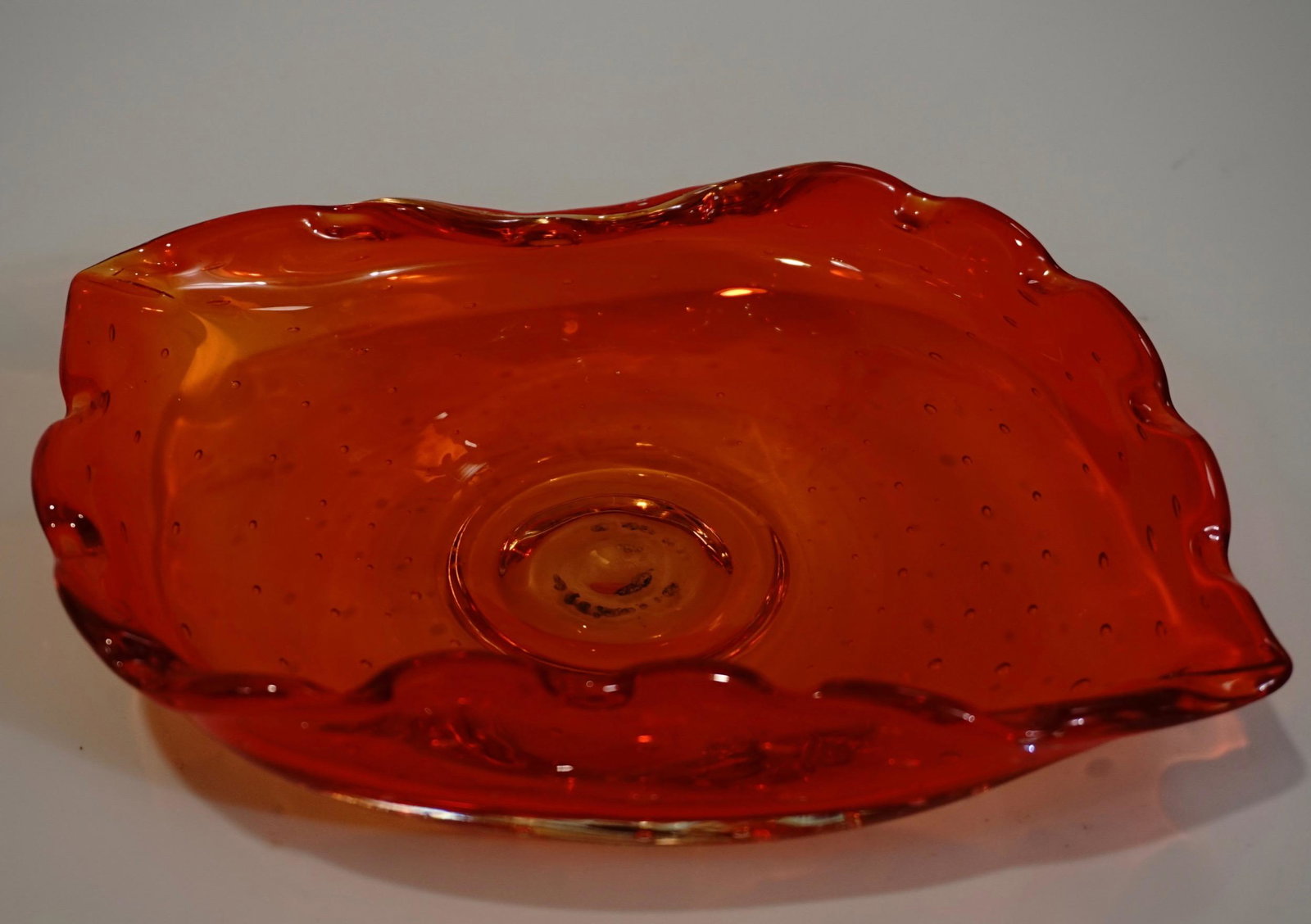 Mid Century Orange Red Art Glass Bowl Controlled: Mid Century Orange Red Art Glass Bowl Controlled Bubbles Approximately 8 1/8 x 6 1/8 inches.