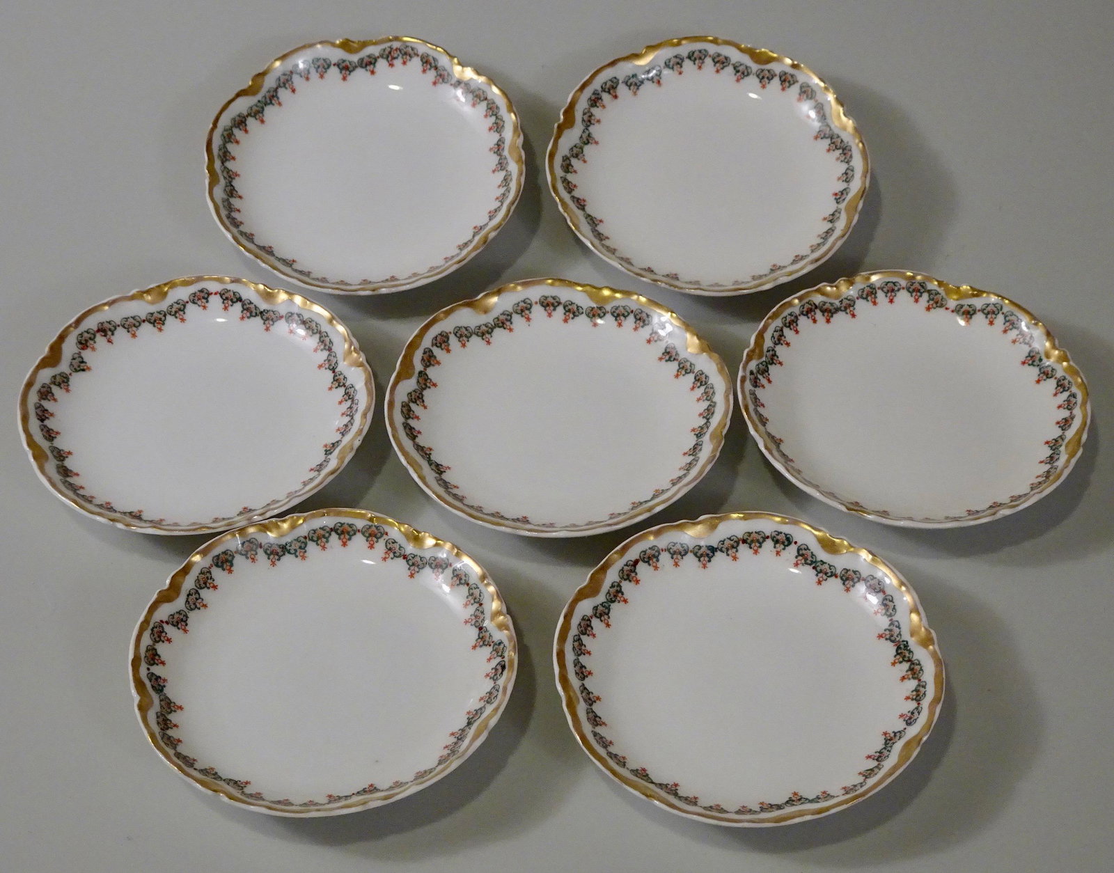 Antique Haviland Limoges Porcelain Butter Pat Plates: Antique Haviland Limoges Porcelain Butter Pat Plates Lot of 7 Approximately 3 1/8 inches in diameter.