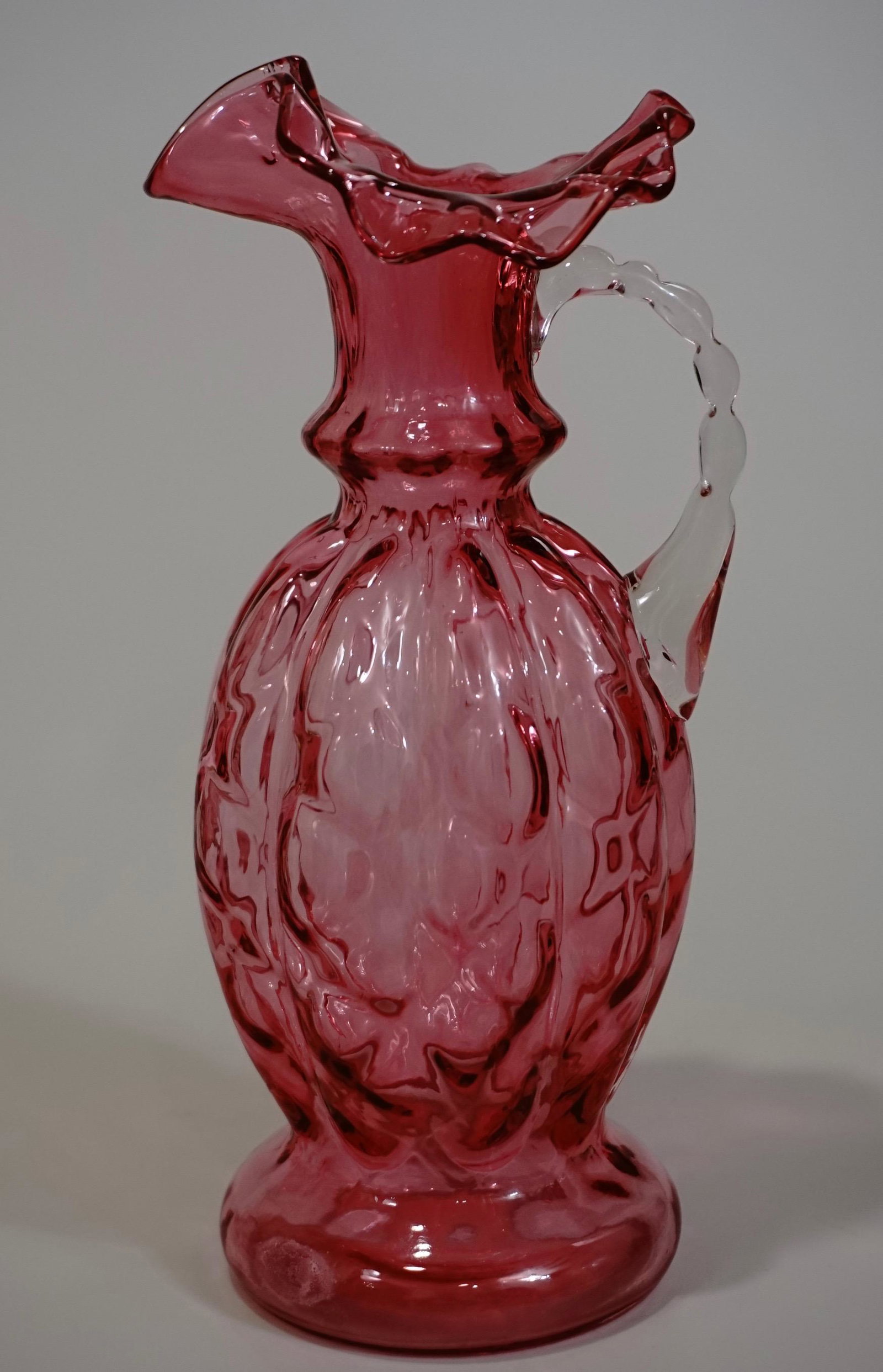 Victorian Art Glass Cranberry Pitcher Quilted: Victorian Art Glass Cranberry Pitcher Quilted Approximately 8 5/8 inches tall.