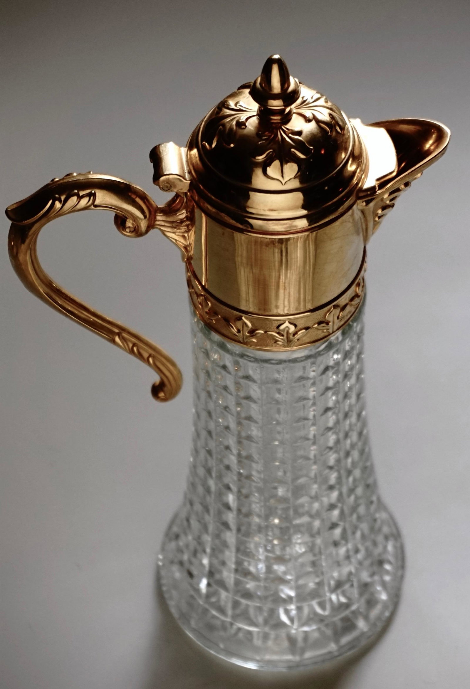 Italian Pitcher Decanter Diamond Point Glass Gold Metal: Italian Diamond Point Glass Gilded Metal Pitcher Wine Decanter Approximately 11 5/8 inches tall.
