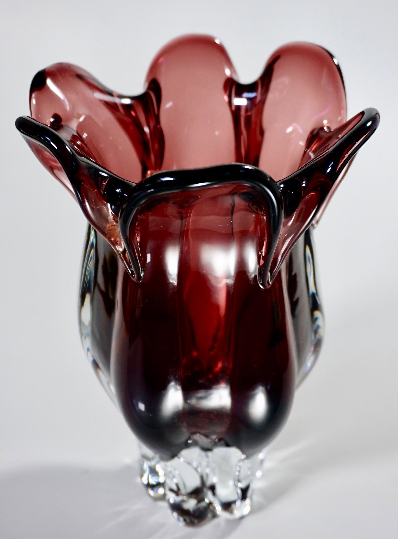 Heavy Molded Glass Purple Flower Vase: Heavy Molded Glass Purple Flower Vase Approximately 5 3/4 inches across x 9 5/16 inches tall.