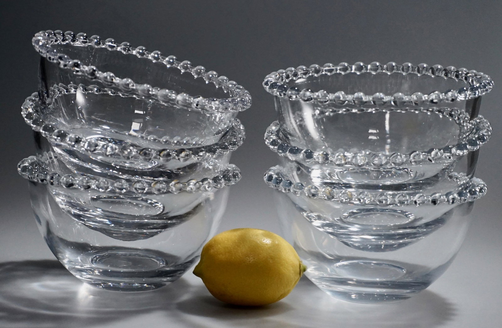 Clear Glass Beaded Border Bowl Lot of 6 Bowls: Clear Glass Beaded Border Bowl Lot of 6 Bowls Approximately 2 13/16 x 5 1/4 inches in diameter.