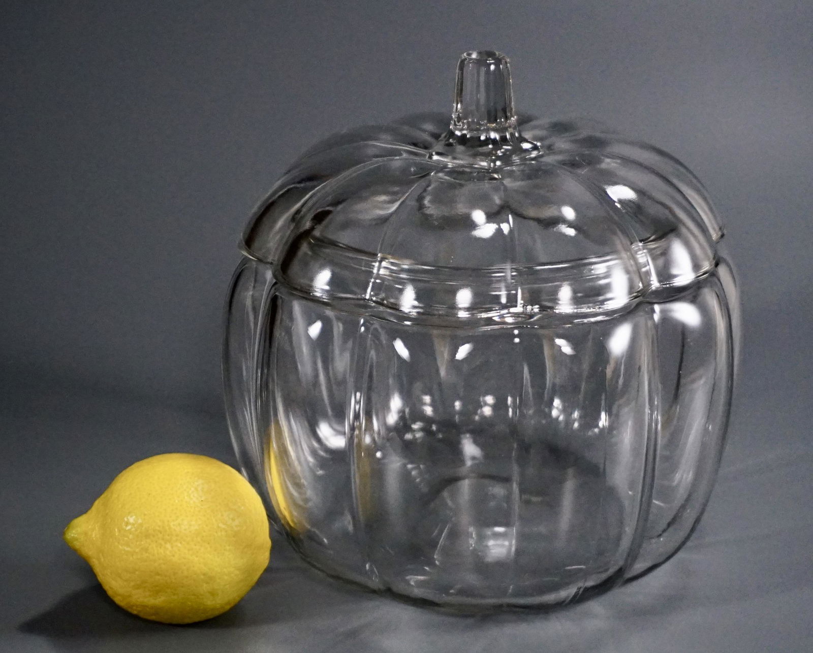 Clear Glass Pumpkin Jar Box Candy Bowl Seasonal Decor: Clear Glass Pumpkin Jar Box Candy Bowl Seasonal Decor Approximately 6 1/2 inches in diameter x 7 1/2 inches tall overall.