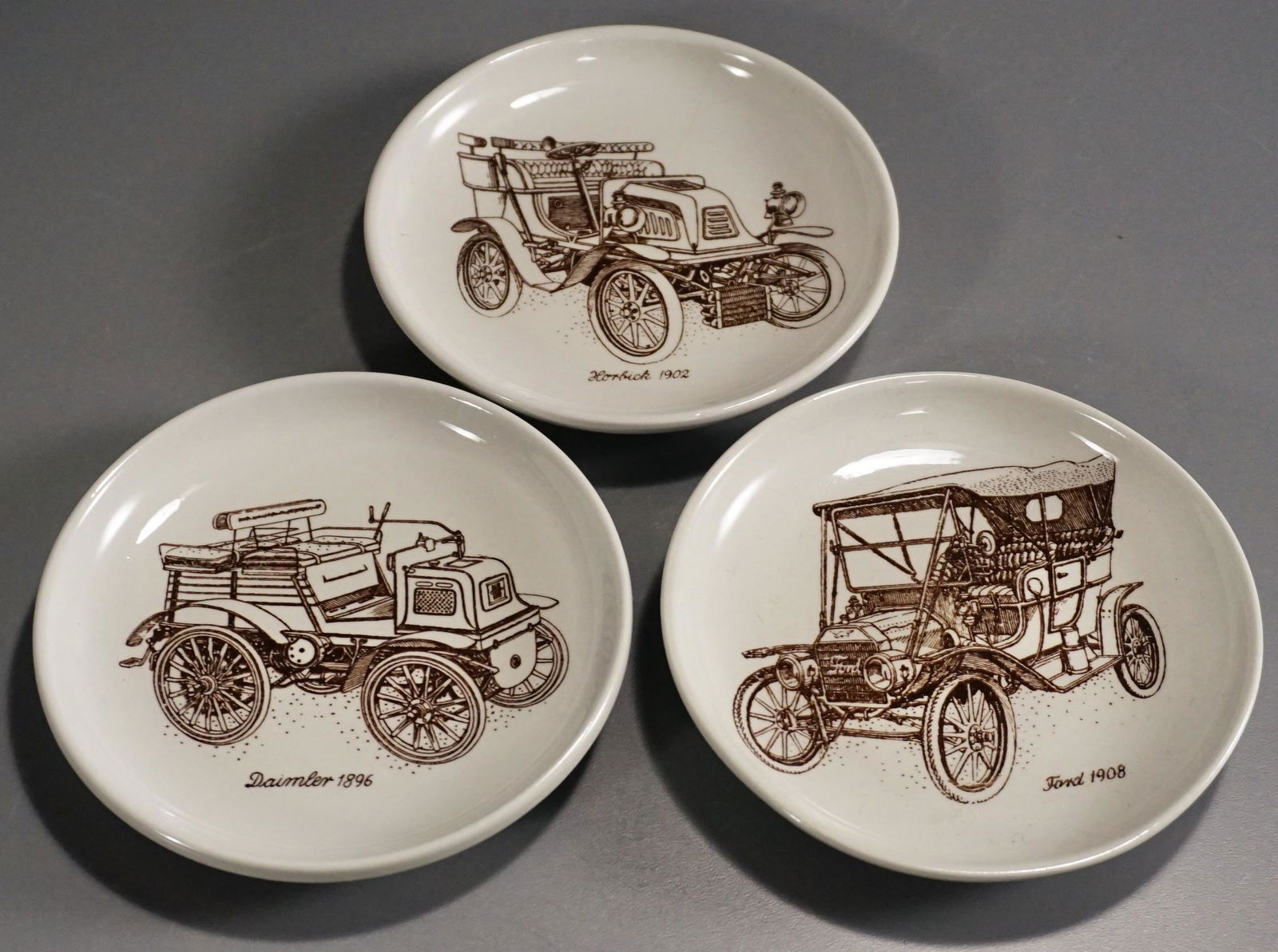 Denmark Antique Cars Roundell Mid Century Plaques: Denmark Antique Cars Roundell Mid Century Plaques Daimler Ford Horbick Lot of 3 Approximately 4 3/8 inches in diameter.