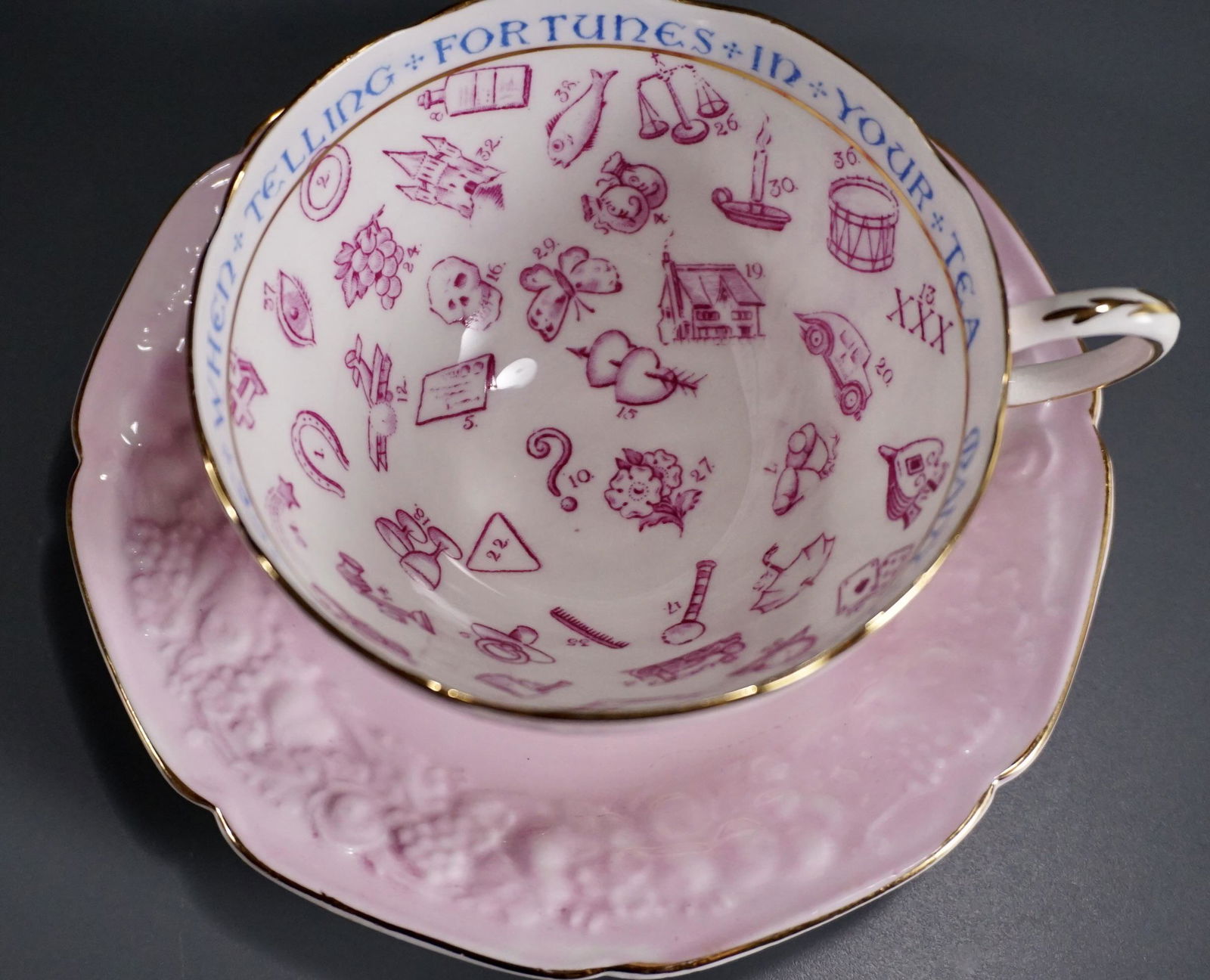 Signs and Omens Mystical Paragon Destiny China Fortune: Signs and Omens Mystical Paragon Destiny China Fortune Telling Pink Tea Cup Saucer Set Many Curious Things I See When Telling Fortunes In Your Tea Cup is approximately 4 3/4 x 3 7/8 x 2 3/16 inches ta