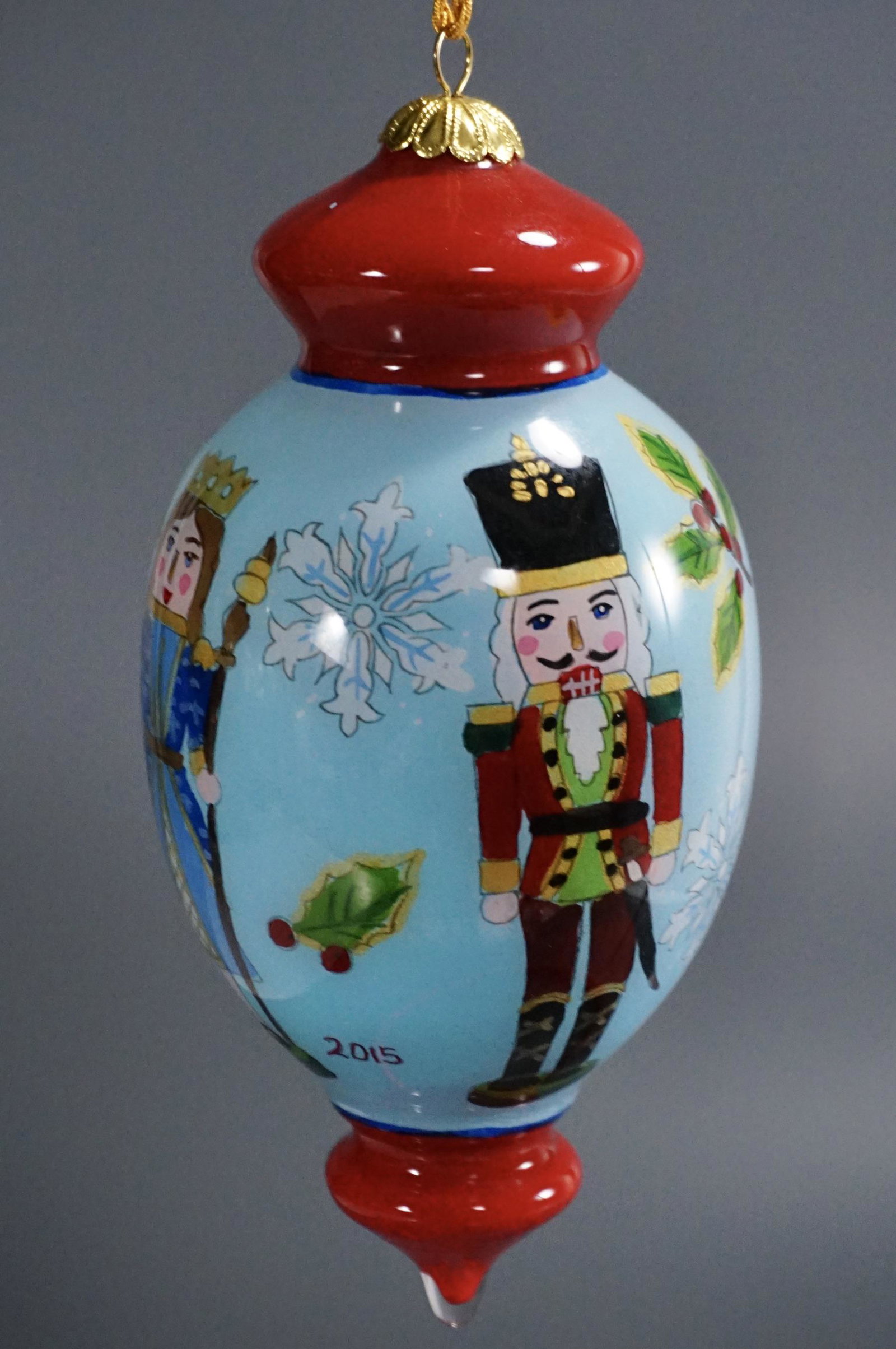 Reverse Painted Glass Nutcracker Large Christmas Tree: Reverse Painted Glass Nutcracker Large Christmas Tree Ornament Approximately 5 7/8 inches.