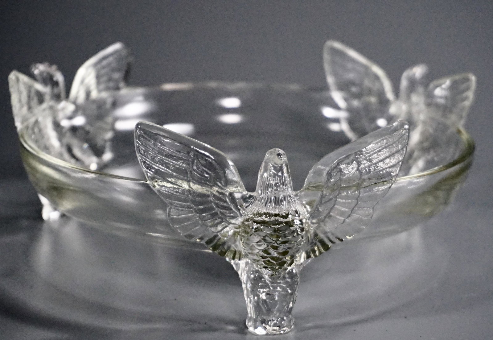 Jeanette Pressed Glass Eagle Footed Bowl Candy Dish: Jeanette Pressed Glass Eagle Footed Bowl Candy Dish Approximately 3 x 7 3/4 inches in diameter.