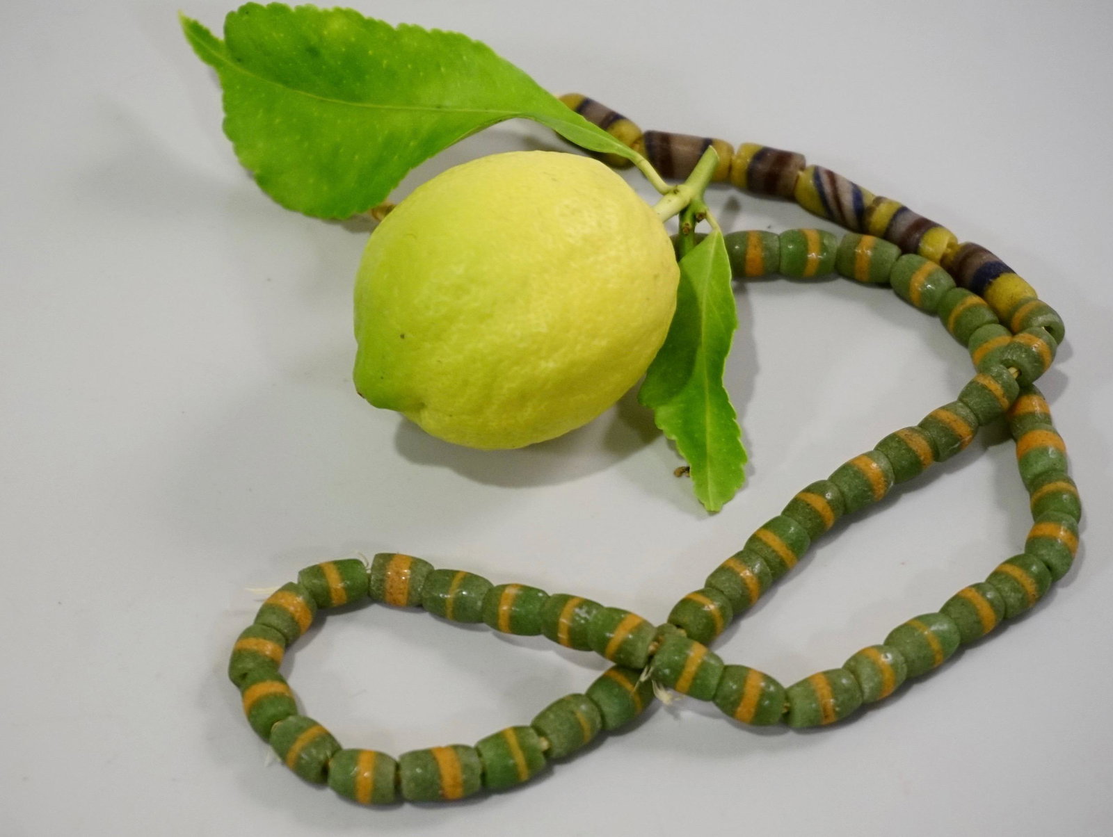Green Glass Trading Beads String Necklace: Green Glass Trading Beads String Necklace Approximately 22 1/2 inches long (beads only).