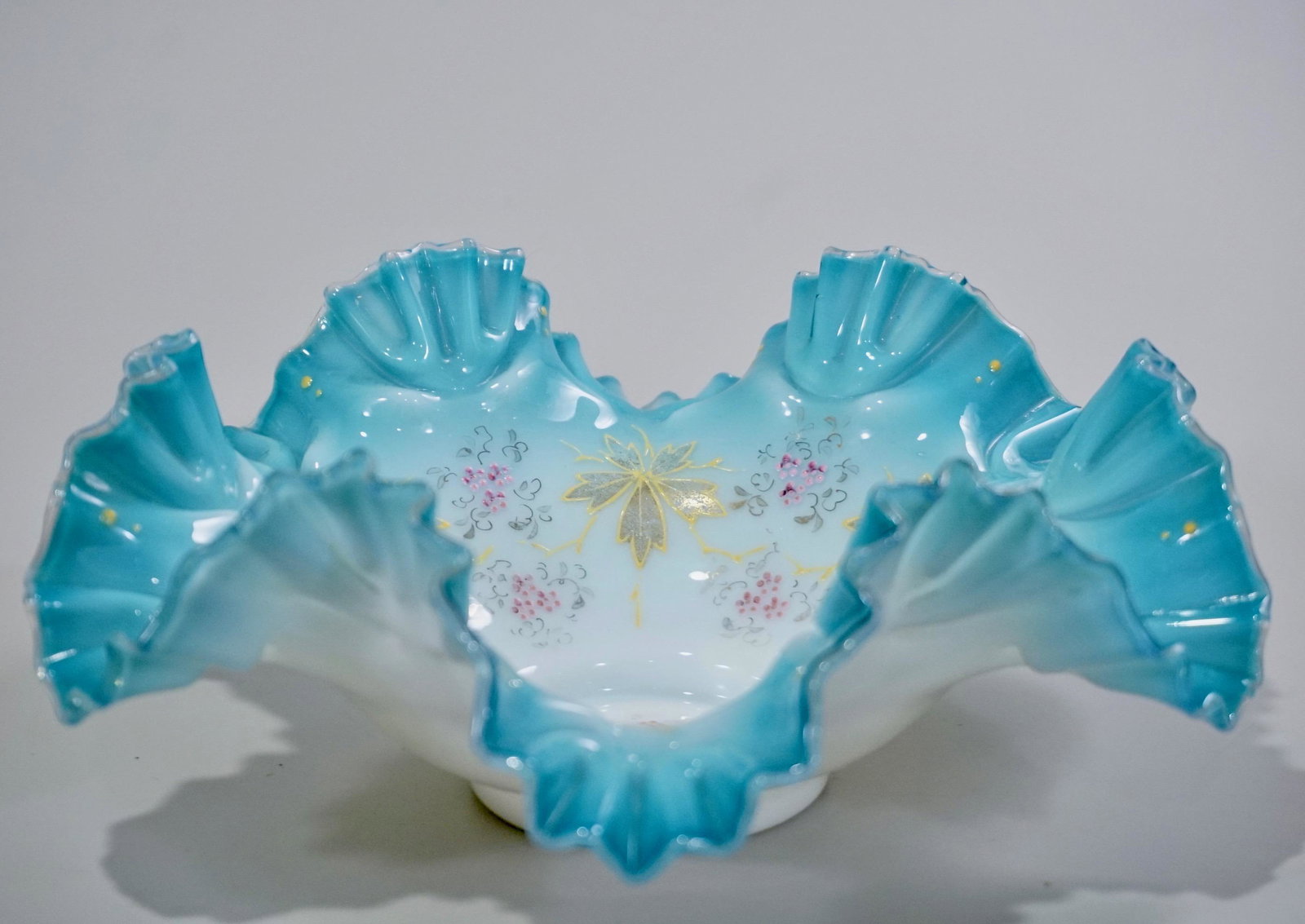 Victorian Brides Basket Crimped Rim Blue Enameled Bowl: Victorian Brides Basket Crimped Rim Blue Enameled Bowl Antique Art Glass Approximately 3 3/4 x 11 inches in diameter.