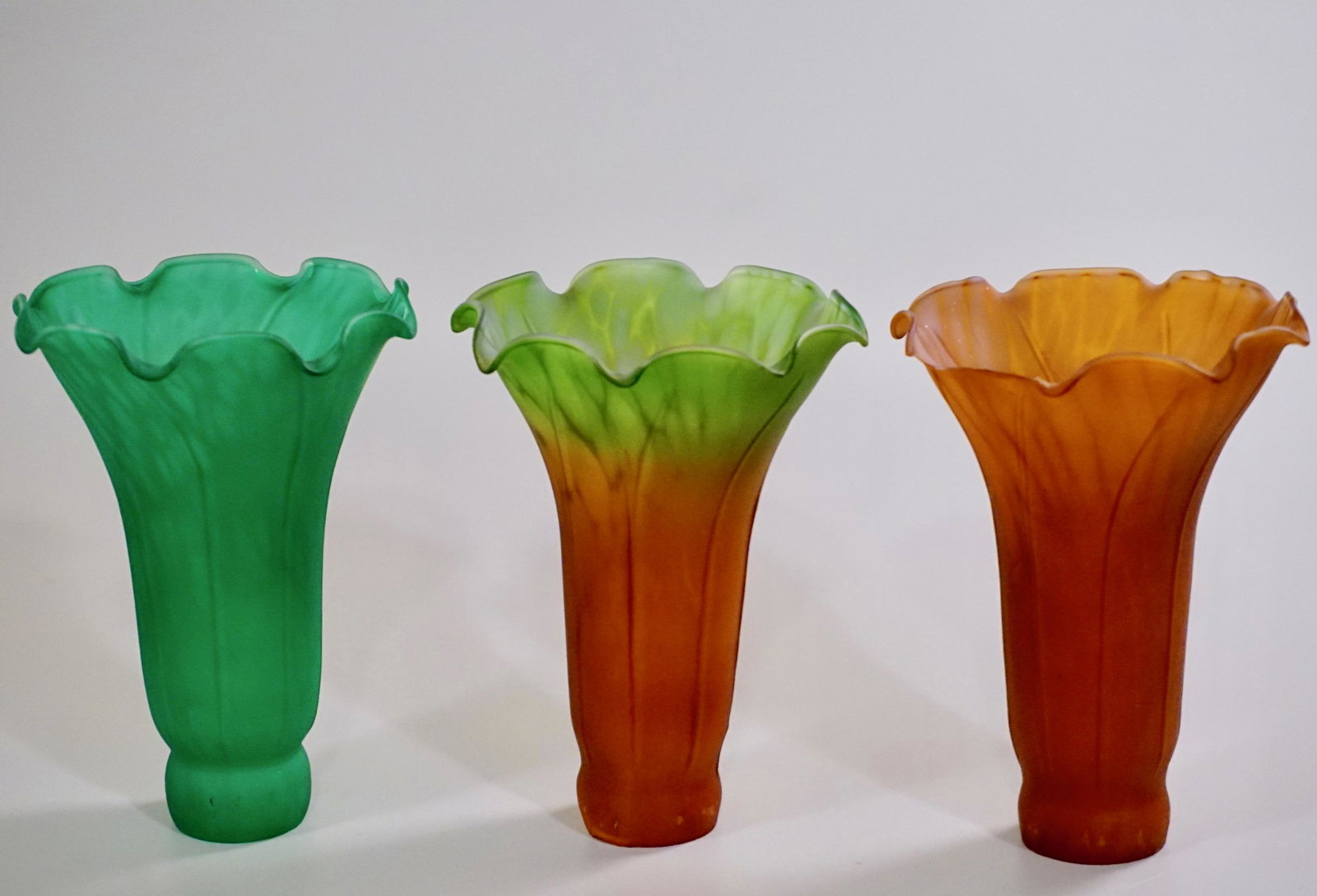Replacement Tulip Lamp Shade Green Amber Glass Lot of 3: Replacement Tulip Lamp Shade Green Amber Glass Lot of 3 Old Stock Never Used Damaged As Is Approximately 6 1/16 x 4 5/16 inches in diameter; 1 1/2 inches in diameter fitter; 1 inch in diameter opening