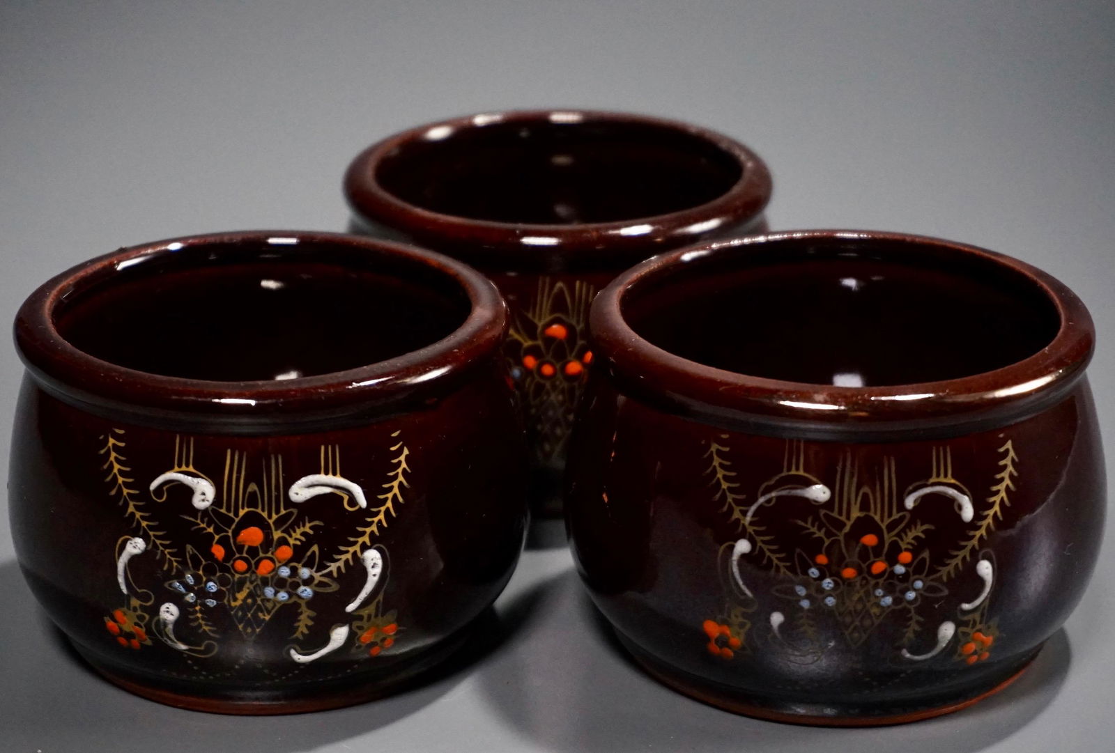 Brown Glazed Moriage Japanese Pottery Redware Bowl: Brown Glazed Moriage Japanese Pottery Bowl Lot of 3 Redware Bowls Enamel Jeweled Decor Approximately 2 3/8 x 3 1/2 inches in diameter.