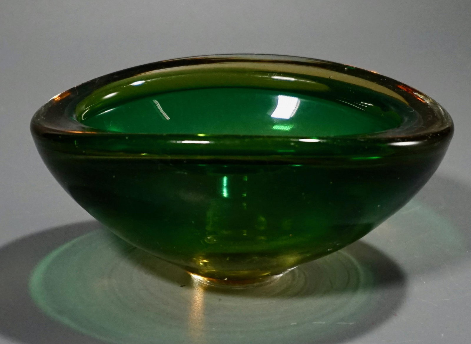 Italian Murano Green Glass Oval Bowl Mid Century Art: Italian Murano Green Glass Oval Bowl Mid Century Art Glass Approximately 2 9/16 x 5 7/16 x 4 3/8 inches.
