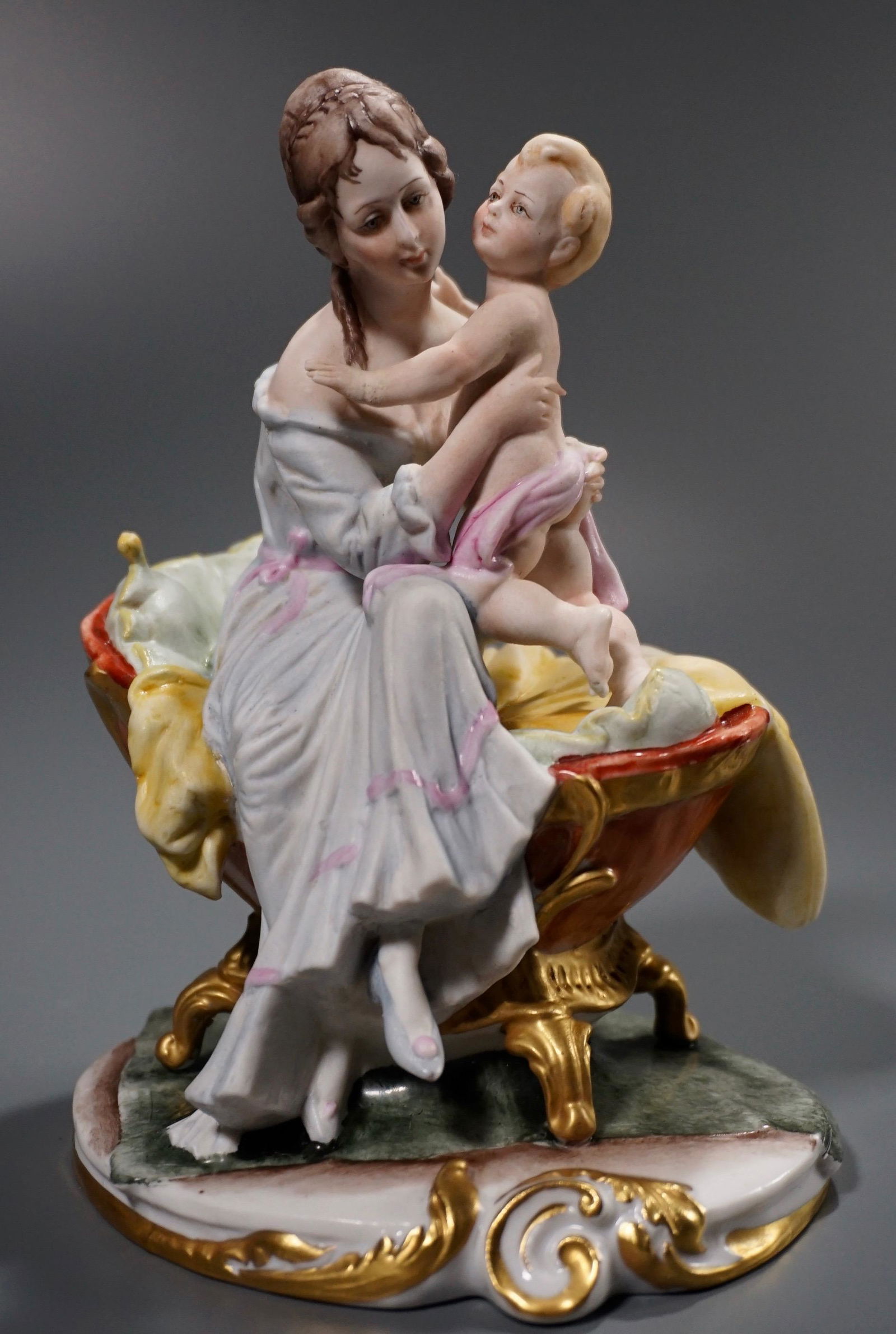 Italian Capodimonte Bisque Porcelain Figurine: Italian Capodimonte Bisque Porcelain Figurine Motherhood Maternity Approximately 6 11/16 inches tall.
