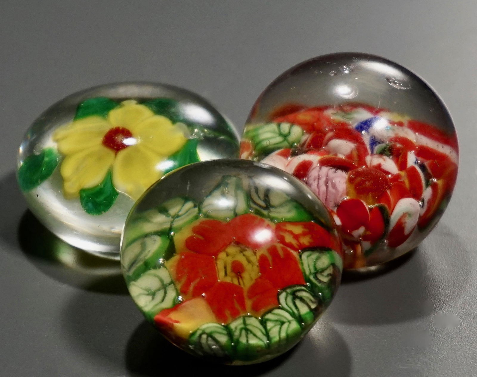 Colorful Small Glass Paperweights Lot of 3: Colorful Small Glass Paperweights Lot of 3 From 1 1/4 to 1 5/8 inches tall approximately.